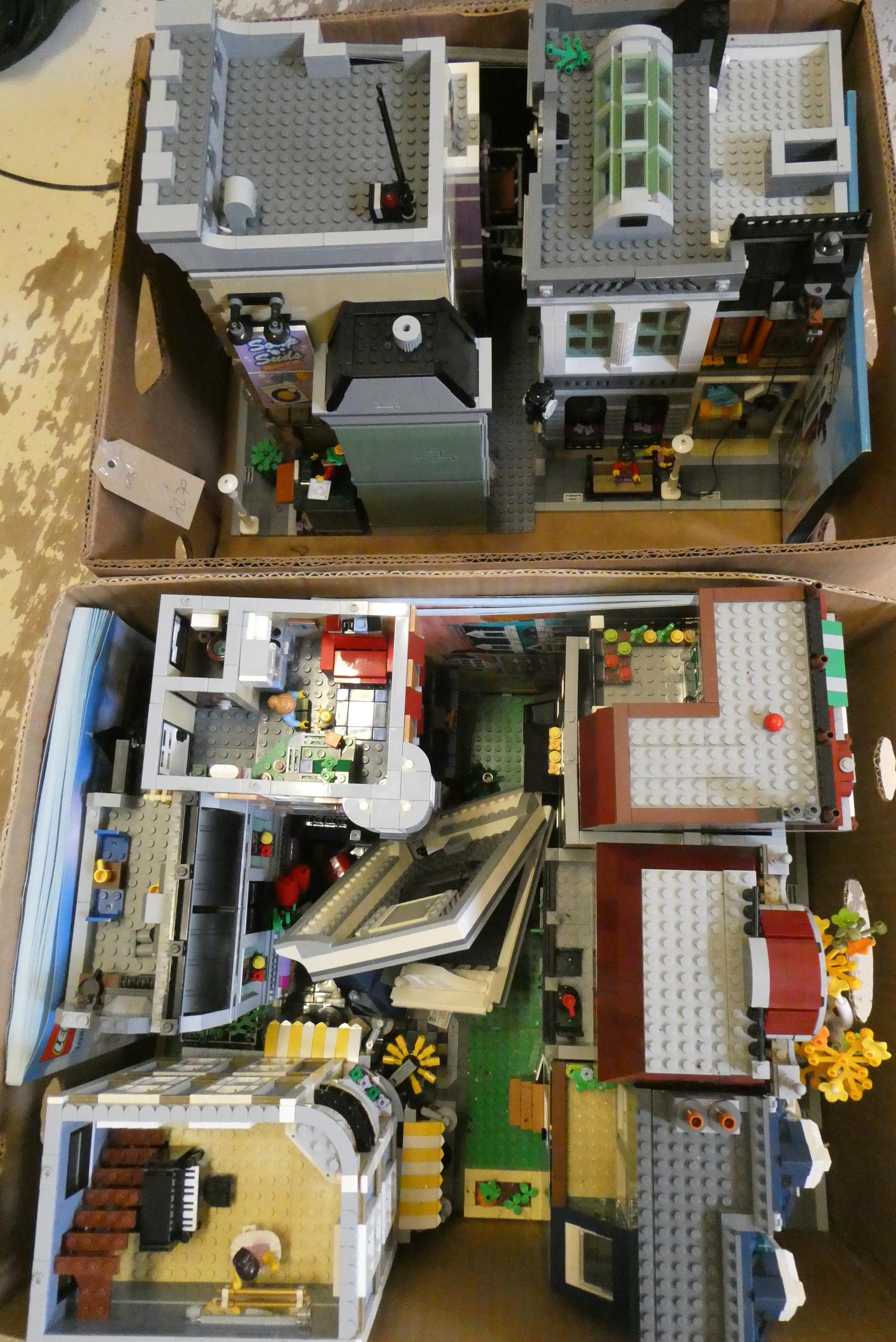 Two boxes of built Lego buildings, unchecked for completeness Image