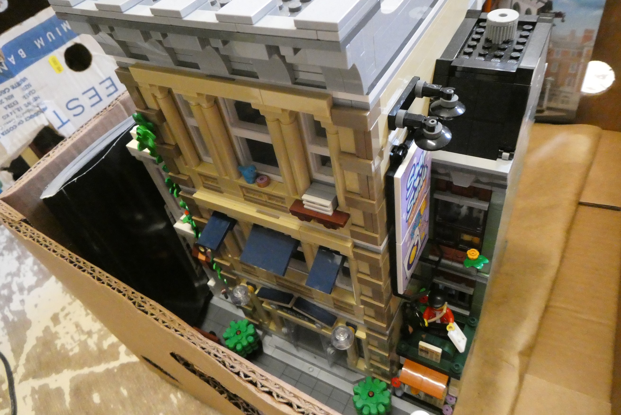 Two boxes of built Lego buildings, unchecked for completeness Image