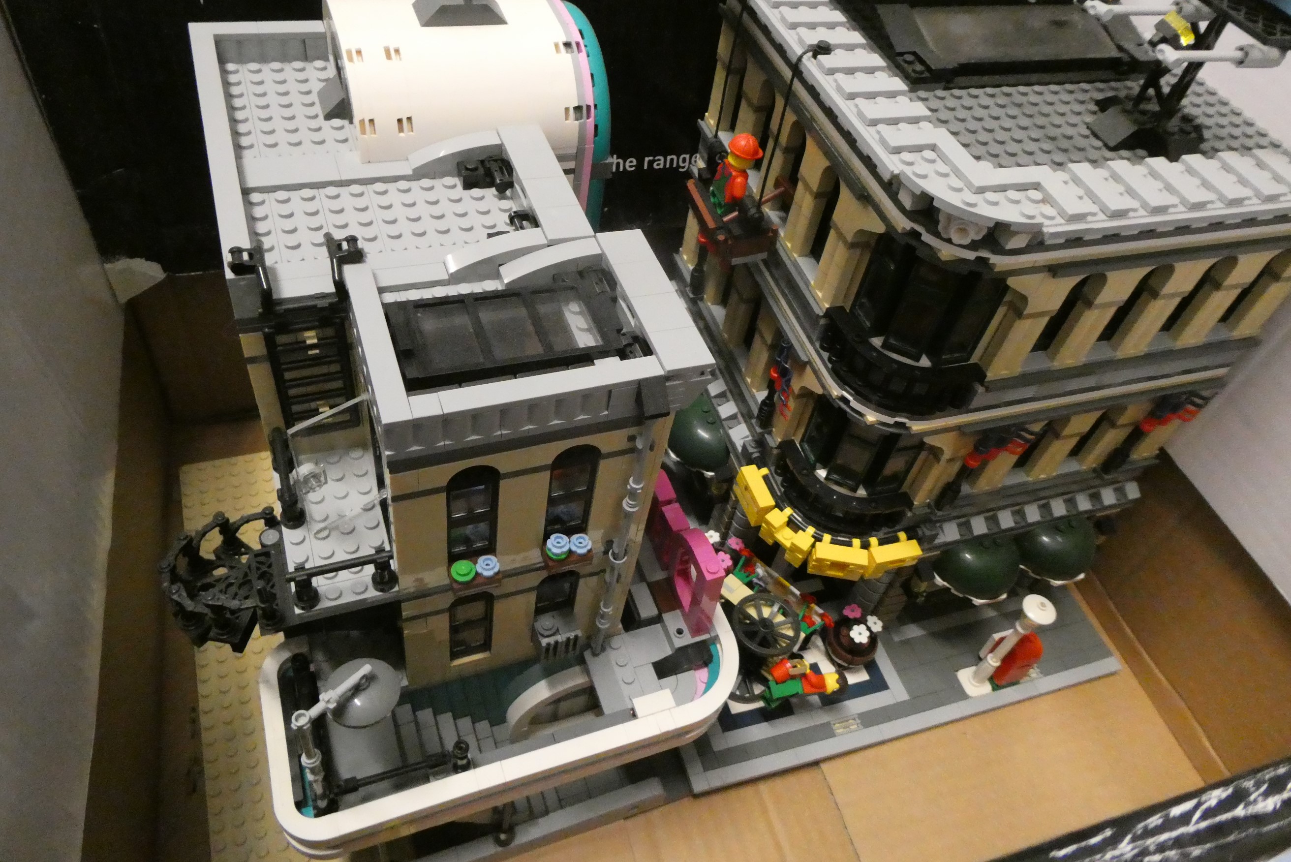 Three boxes of built Lego buildings, unchecked for completeness Image