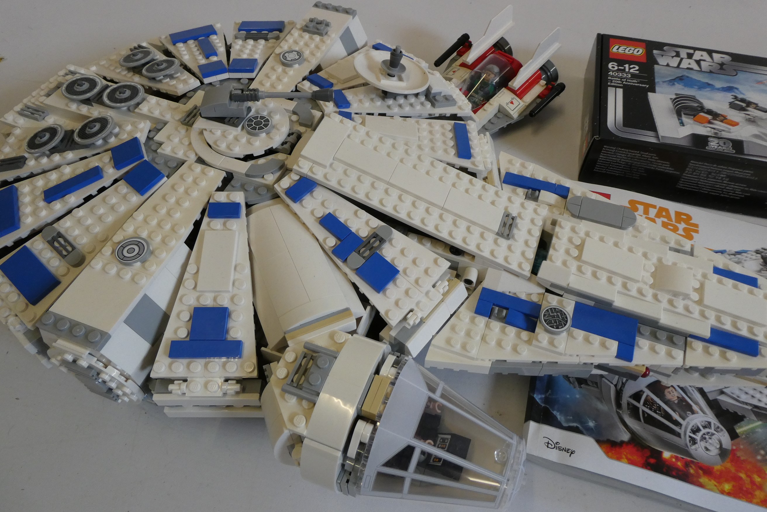 A box of Star Wars Lego, including set 75212 (unboxed and unchecked), set 40333 unopened and another Image