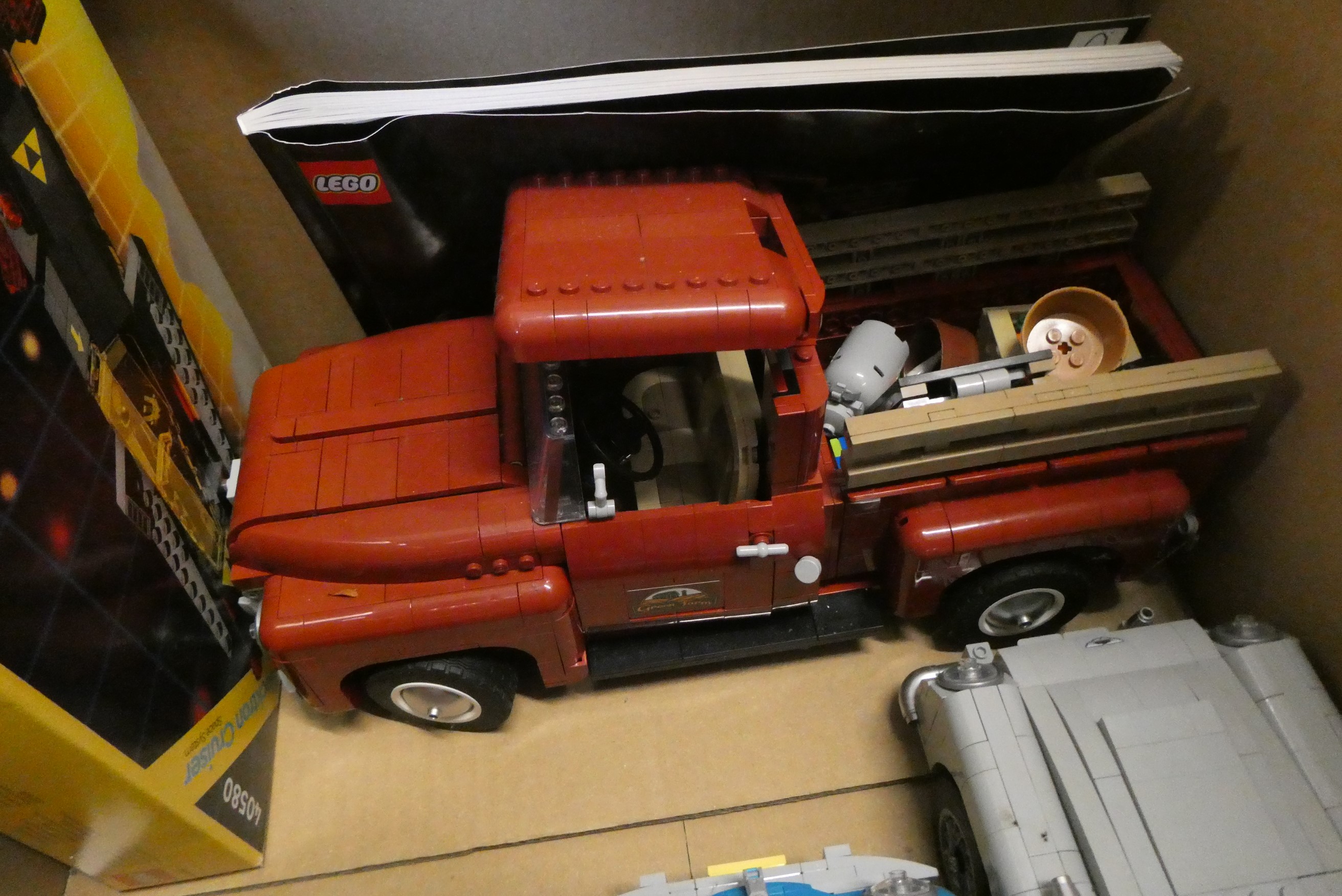 Two boxes of built Lego vehicles, together with an unopened set 40580, unchecked for completeness Image