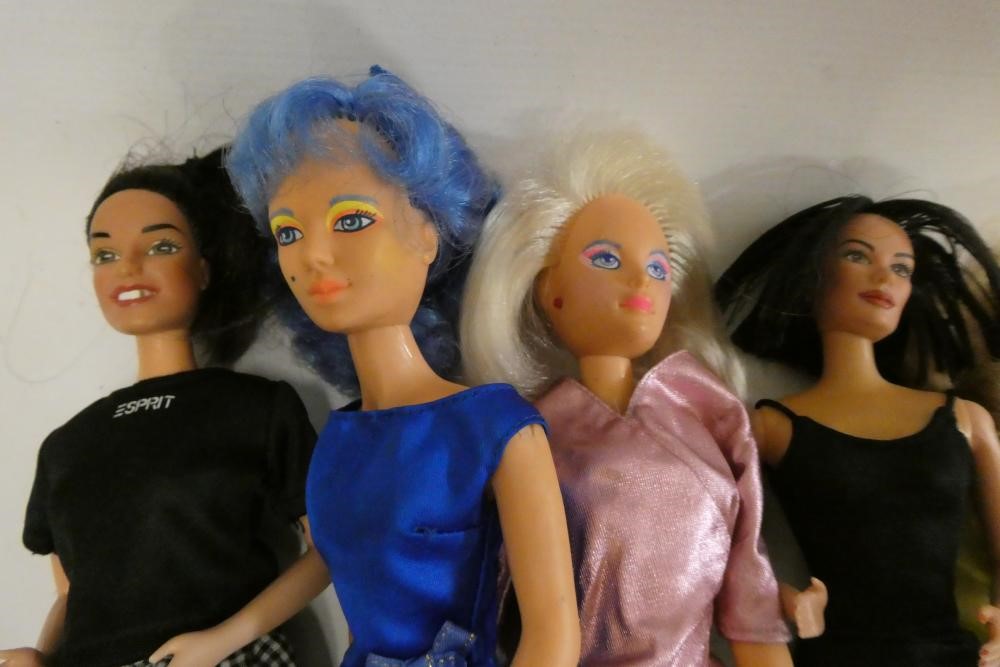 A box of Barbie accessories, Ken dolls, two Sindy dolls and Hasbro celebrity dolls etc, including a Image