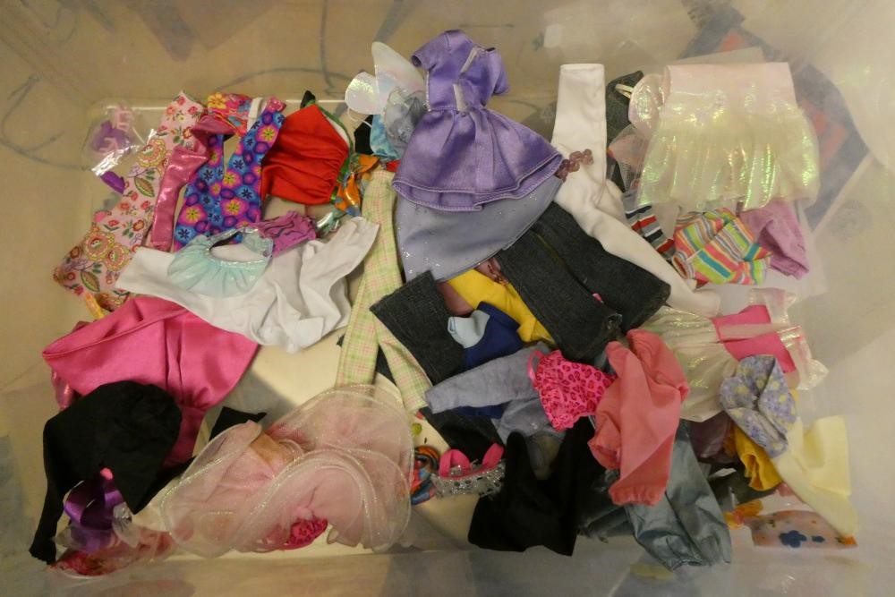 A box of Barbie accessories, Ken dolls, two Sindy dolls and Hasbro celebrity dolls etc, including a Image