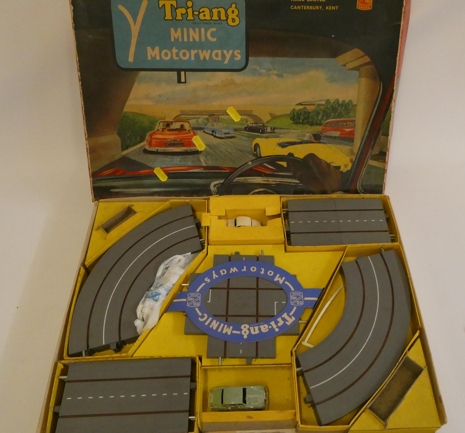 Three motor racing sets comprising Triang Minic motorways, Playcraft Highways No. 2 and Ethics Motor Image
