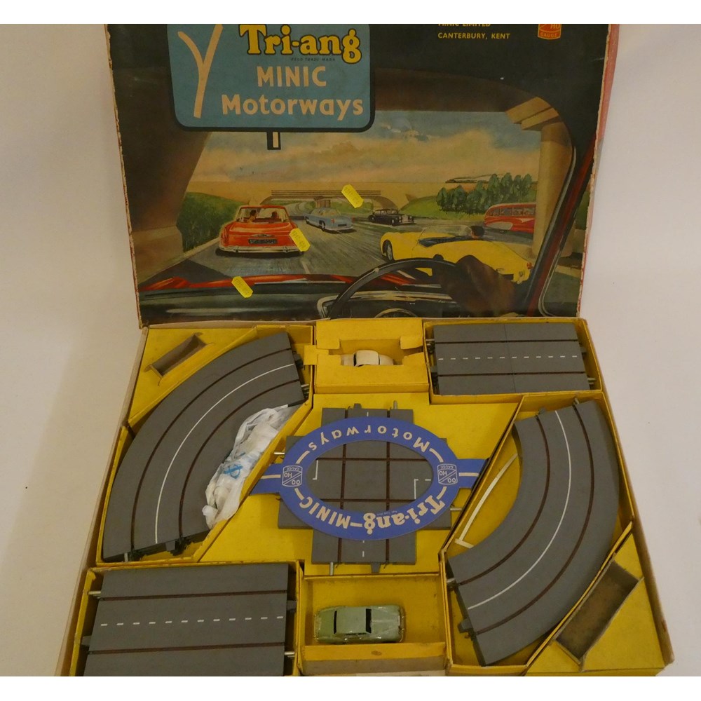 Three motor racing sets comprising Triang Minic motorways, Playcraft Highways No. 2 and Ethics Motor Image