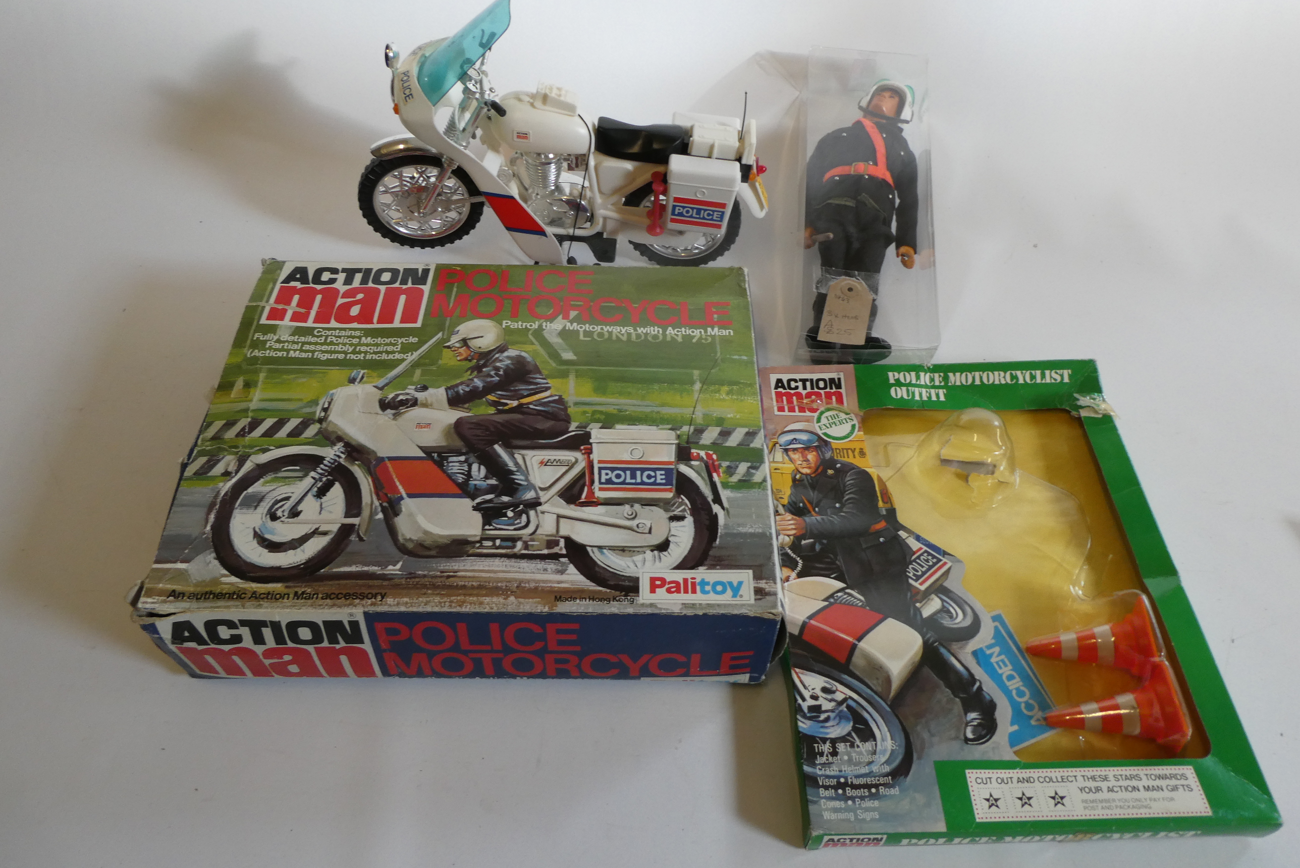 Action Man police motorcyclist and opened police motorcyclist outfit box (police signs still in box) Image