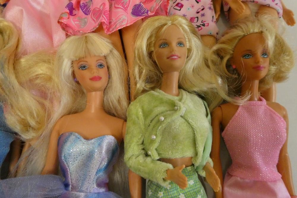 Twelve Barbie dolls, comprising one Mattel 1983 Ken and eleven later Barbies Image