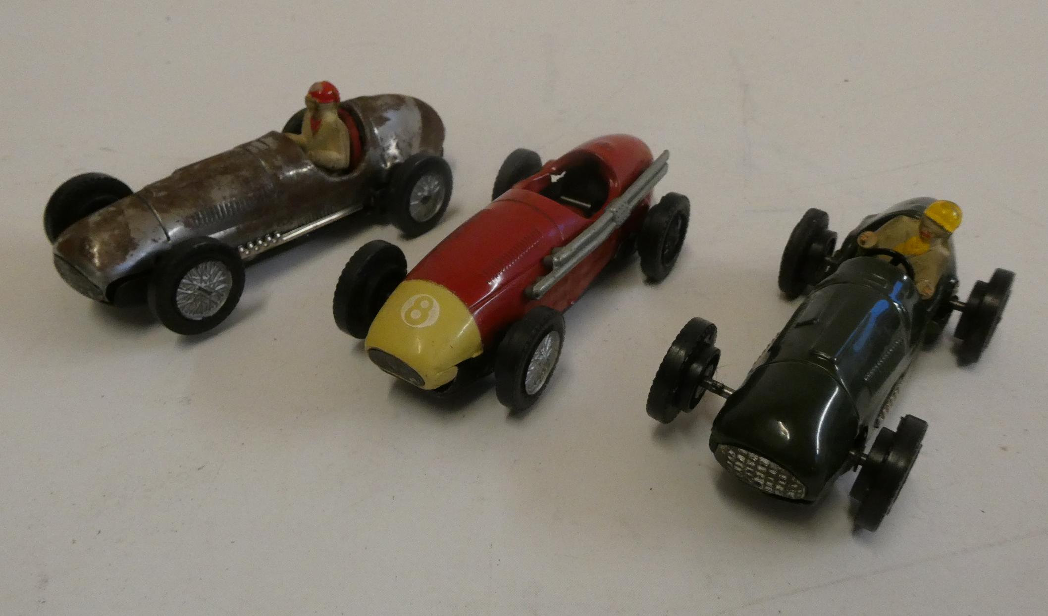Three tinplate Scalextric racing Cars comprising unpainted tinplate race car Image