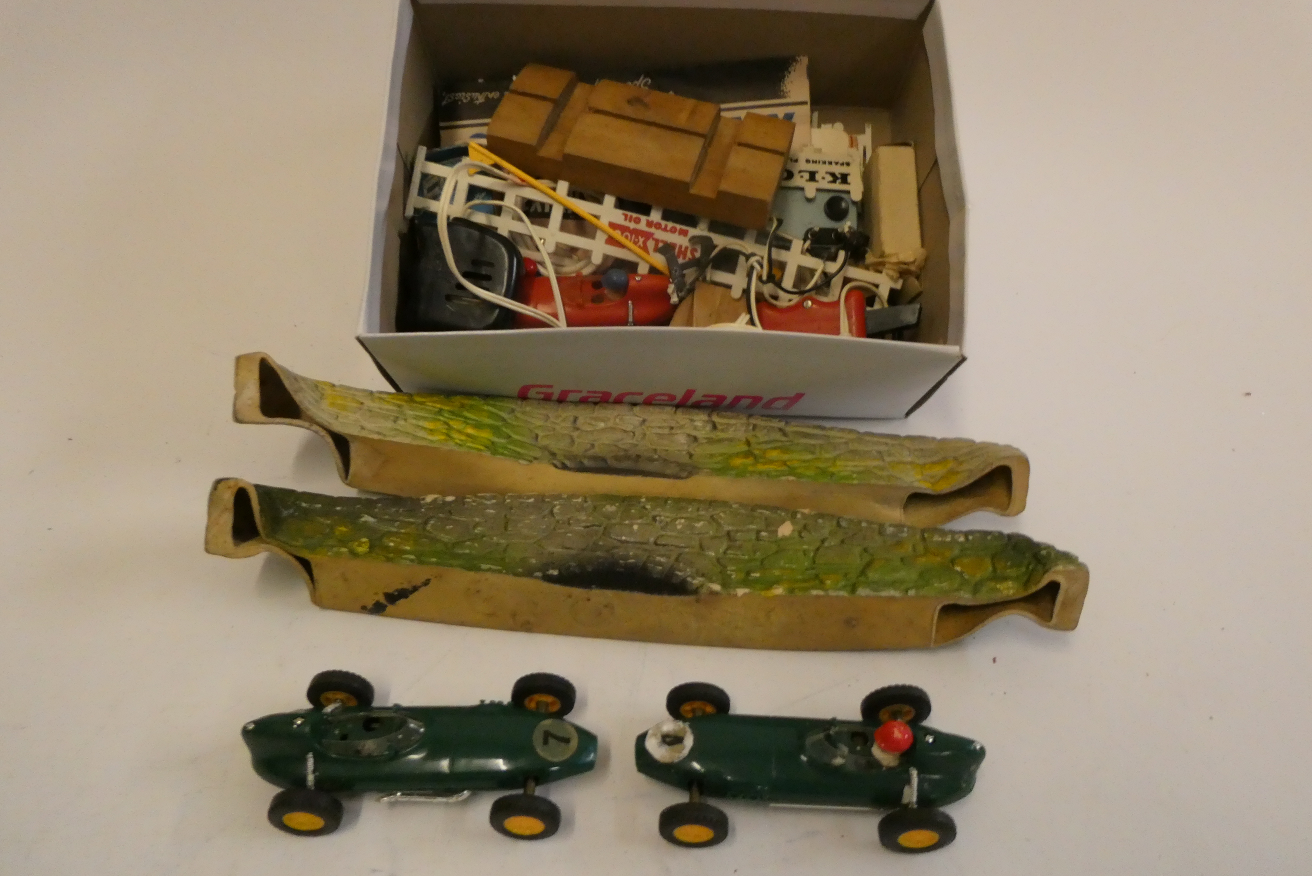 Two Triang Scalextric Lotus race cars finished in green and rubber bridge supports, a few Image