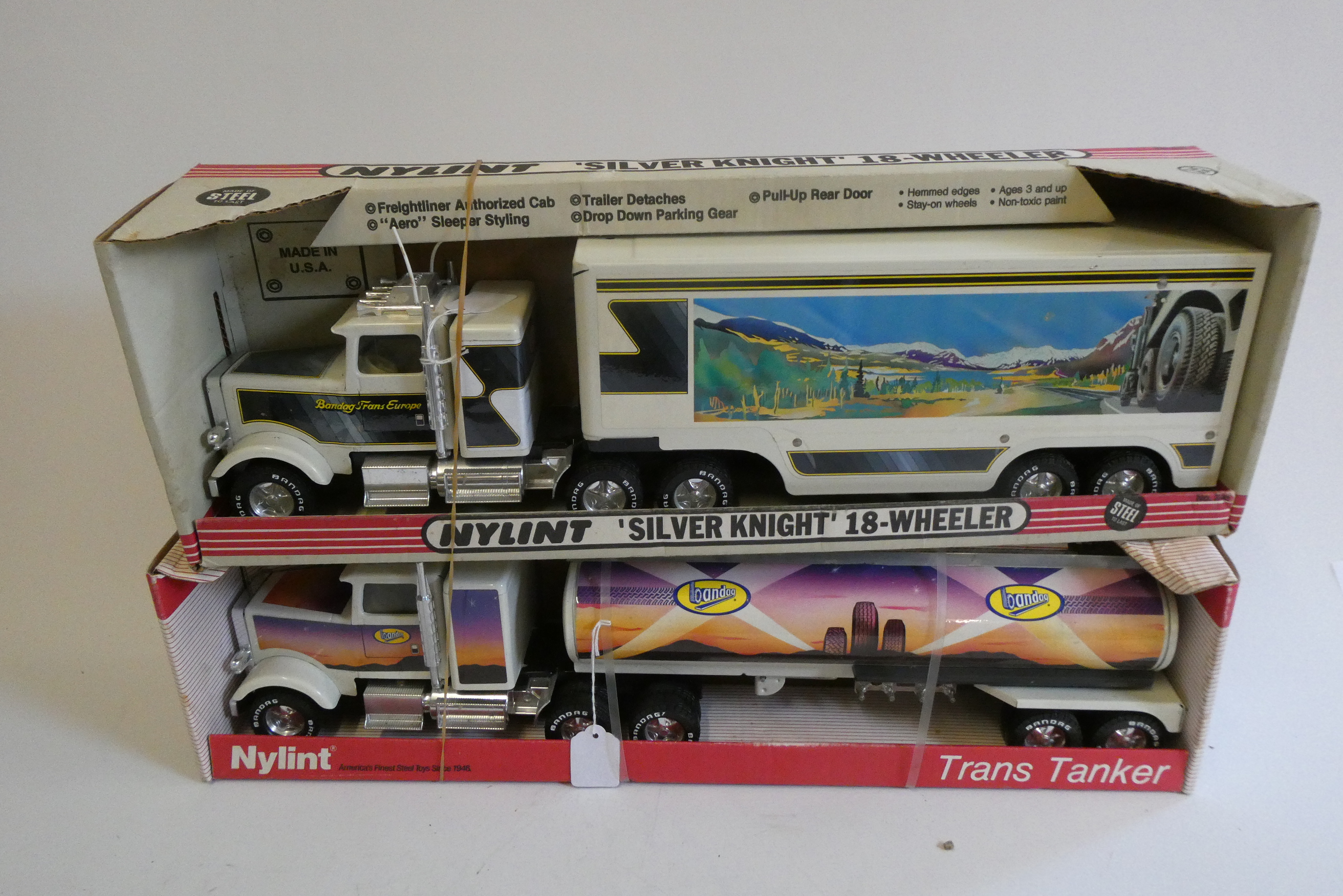 Two large scale American trucks by NYLINT comprising Trans Tanker and Sliver Knight, boxed, good Image