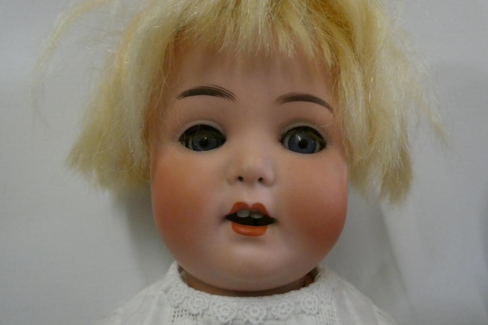 Four vintage dolls, comprising an Armand Marseille 995 9 with sleeping eyes, an Armand Marseille 996 Image