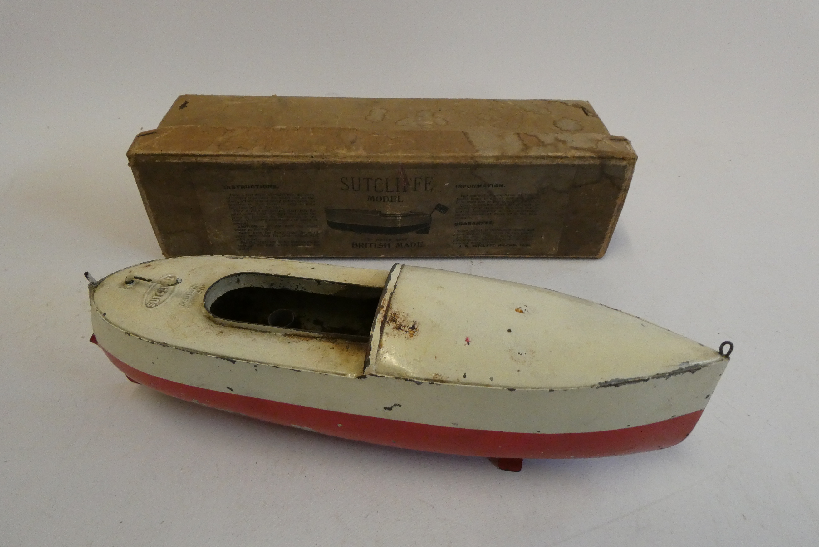 Sutcliffe pre-war Putt-Putt steam powered motorboat, rust to outside of hull under paint work, rust Image