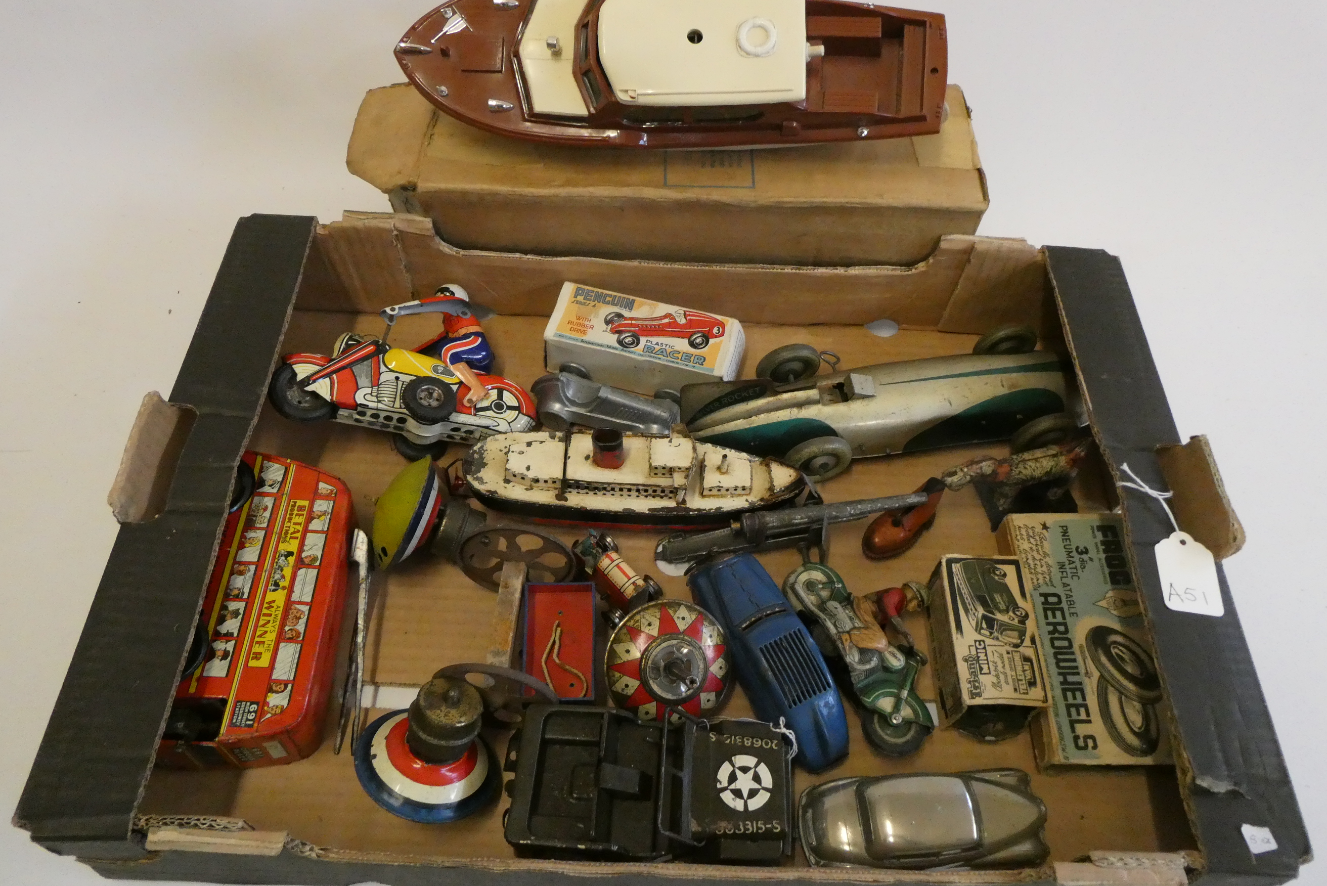 Unboxed tinplate and other vehicles including motorcyclists, bus, race cars and Triang plastic boat, Image