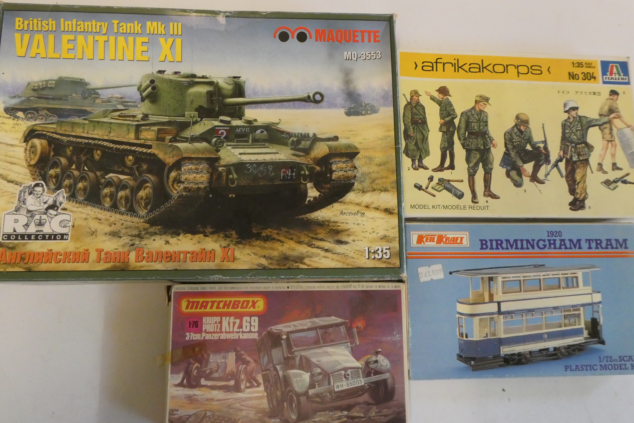 Four plastic construction kits comprising Valentine MKIII British tank Image