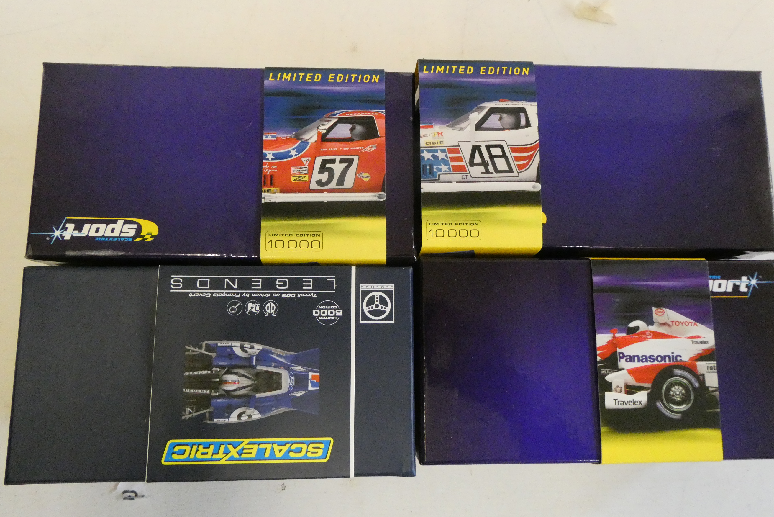 Four Scalextric cars comprising two Chevrolet Corvettes, Toyota TF102 and Terrell F1 car, all items Image