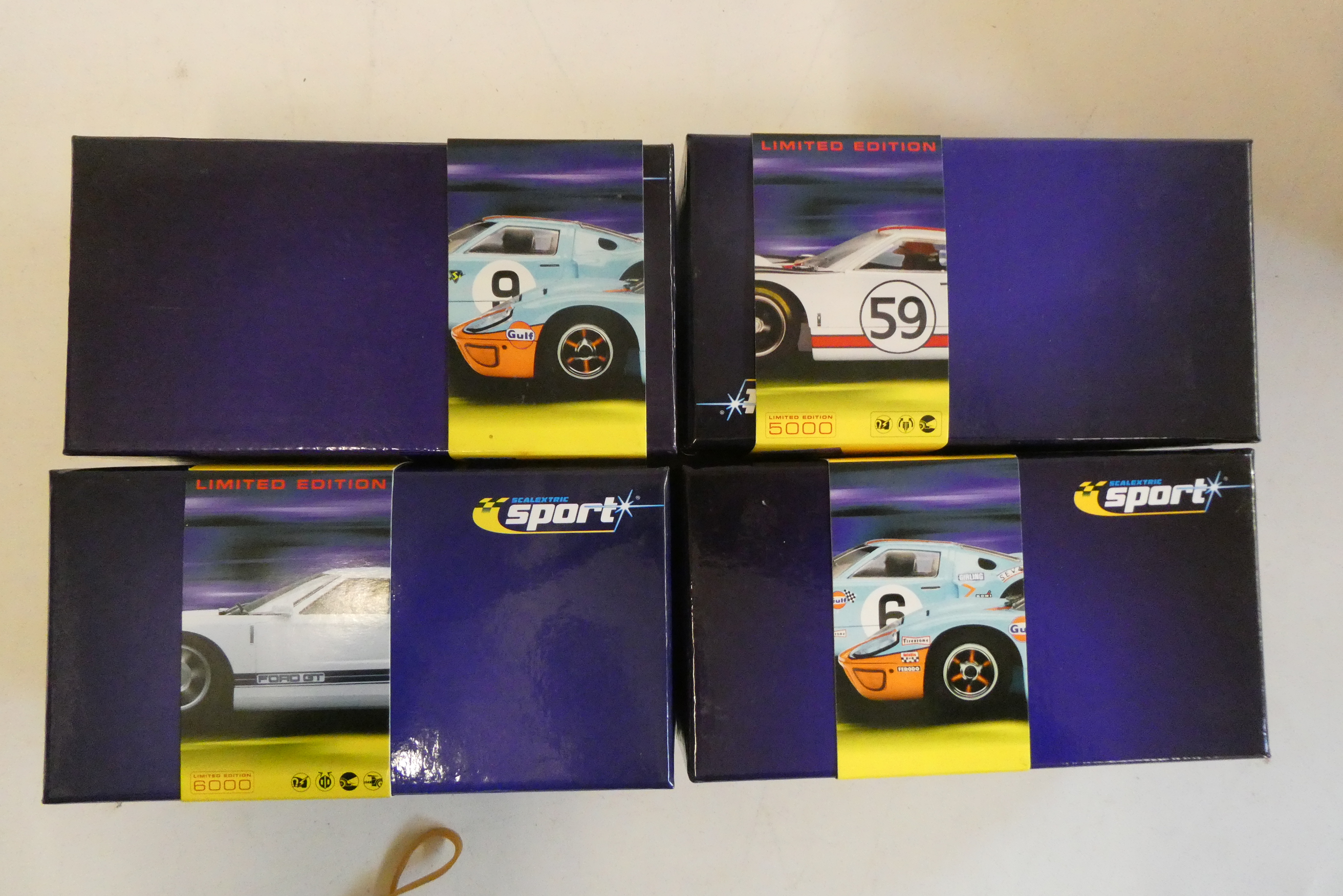 Four Scalextric Ford GT40s comprising 1966, 1968, 1969 and 2003 versions, all items boxed, excellent Image
