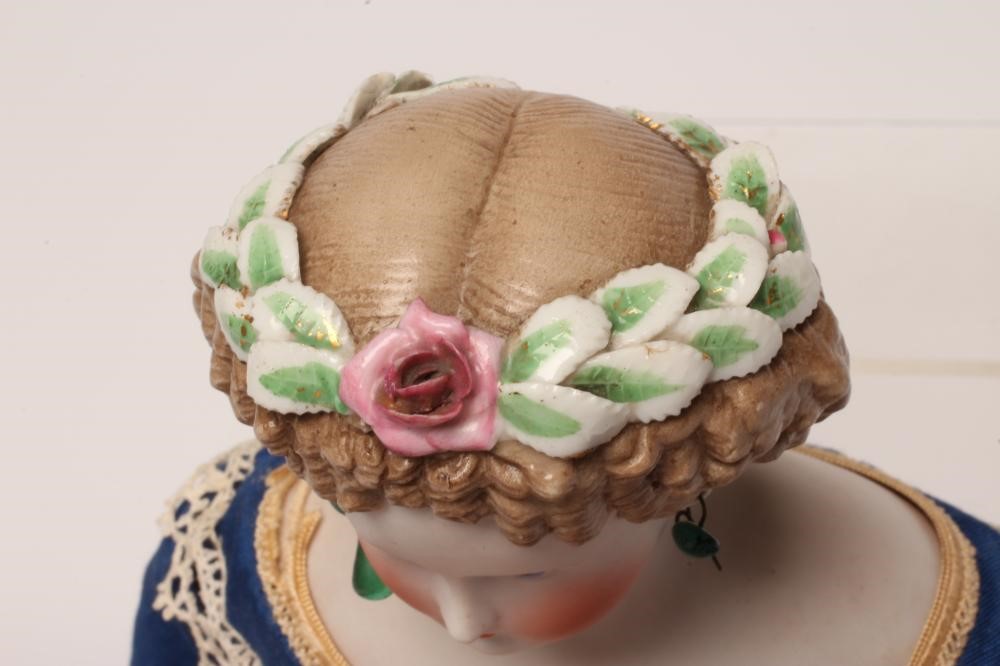 A possible Dornheim Koch & Fischer bisque shoulder head doll, with moulded hair, painted features, Image