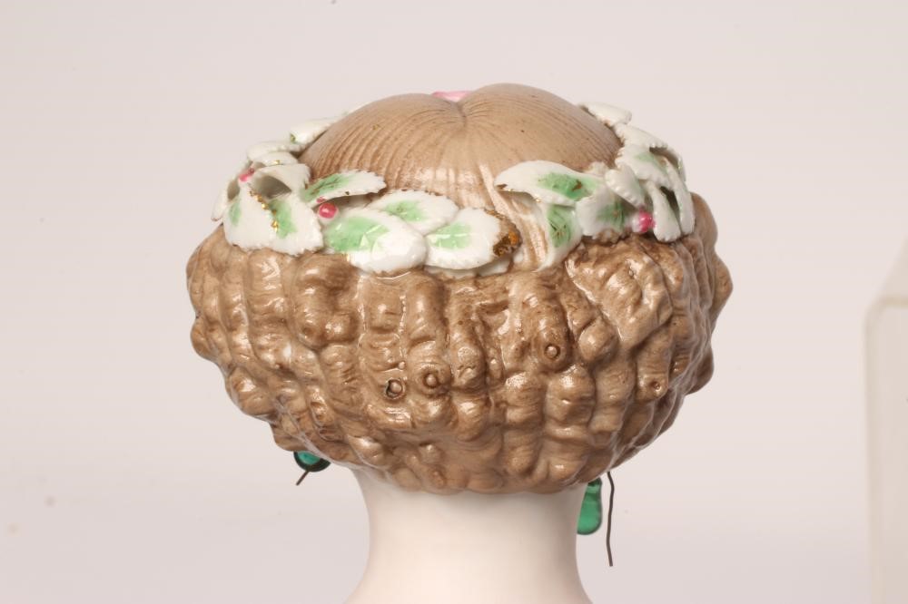 A possible Dornheim Koch & Fischer bisque shoulder head doll, with moulded hair, painted features, Image