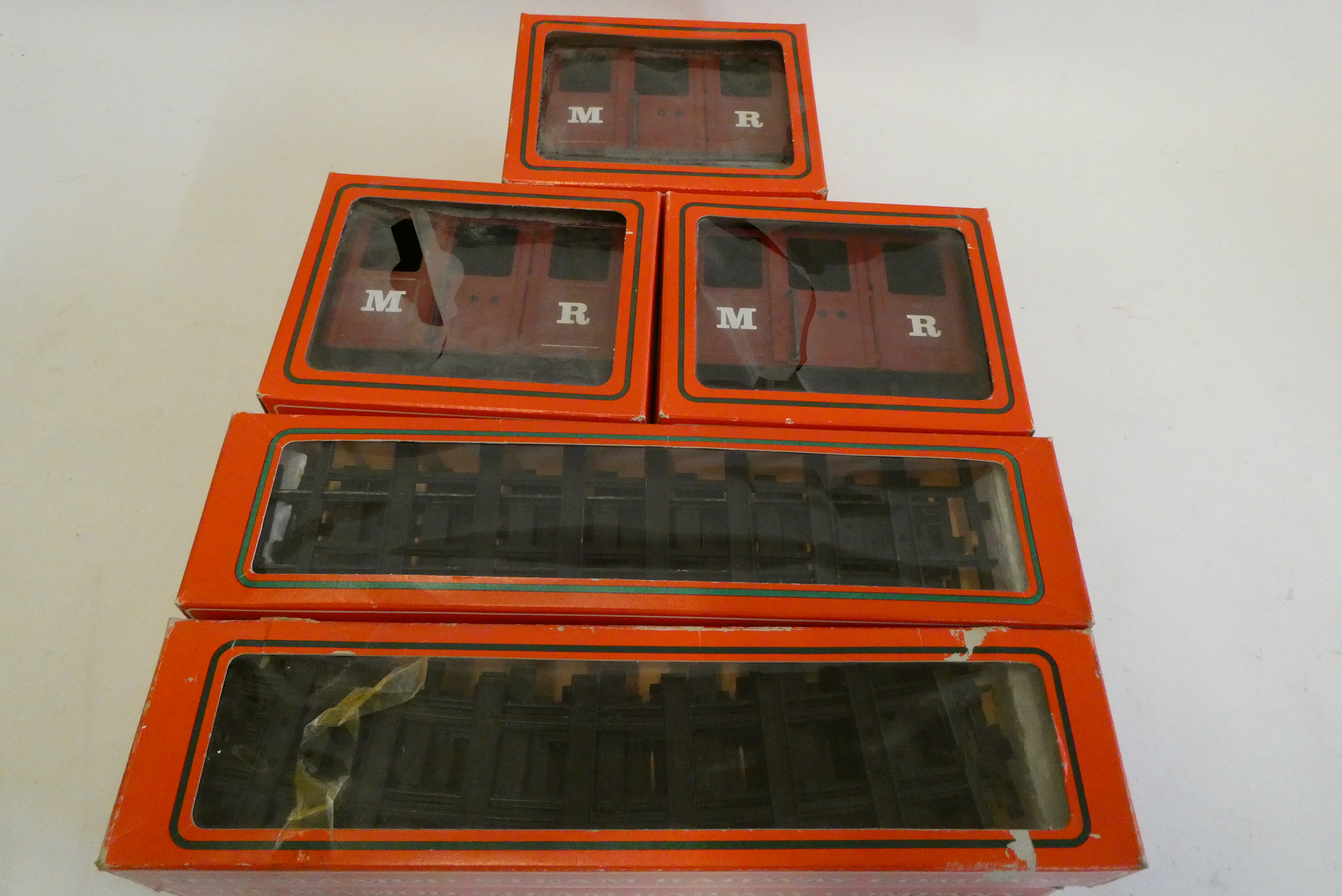 Three Mamod Railways coaches in maroon also four boxes of Mamod track, all items boxed, good Image