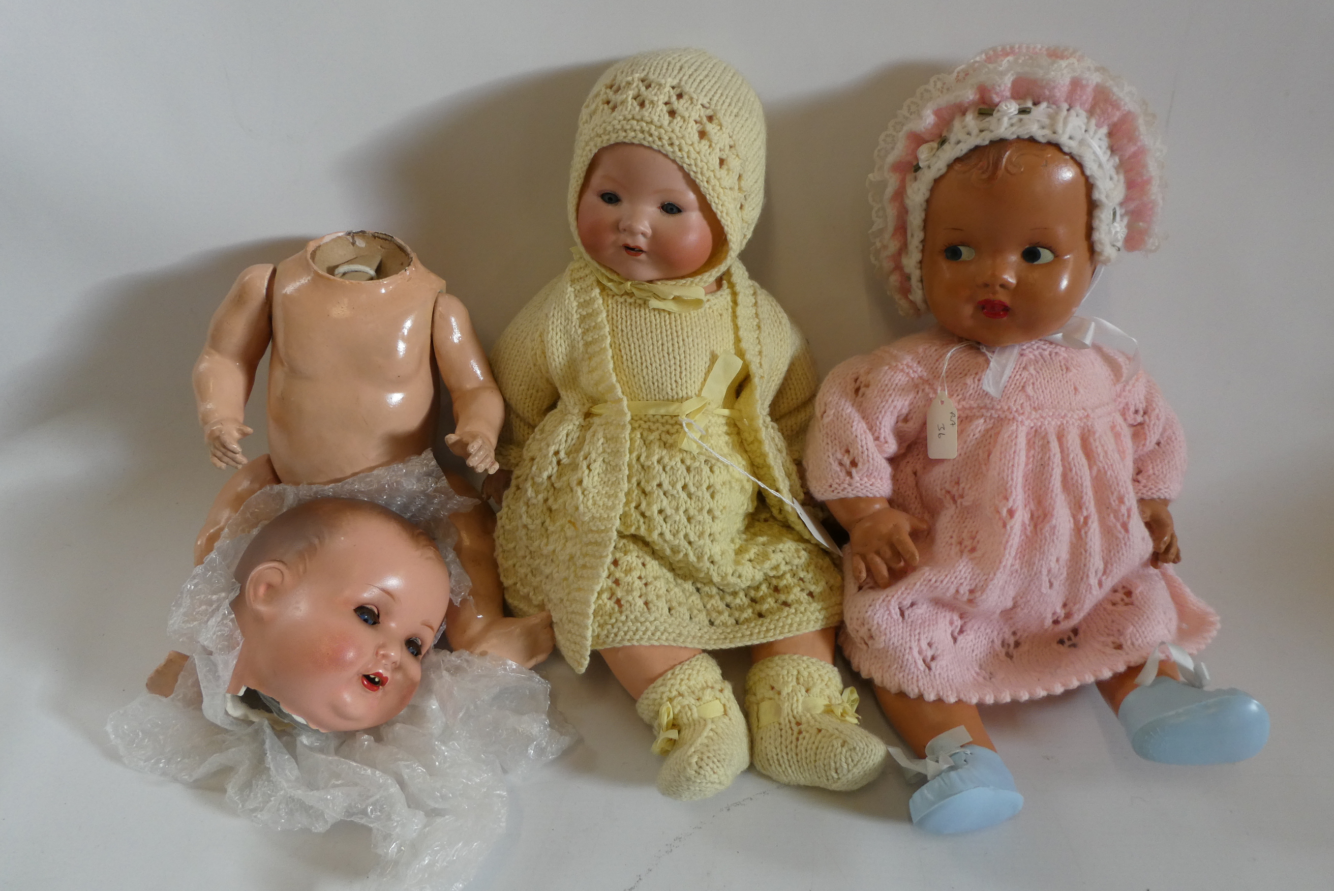 Three vintage dolls, comprising an 18" Armand Marseille 351/4k baby doll with sleeping eyes, another Image