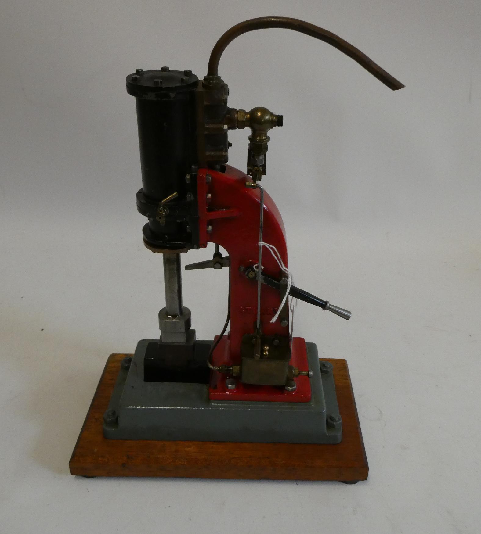 Stuart Turner steam hammer finished in red and grey on wooden base, good Image