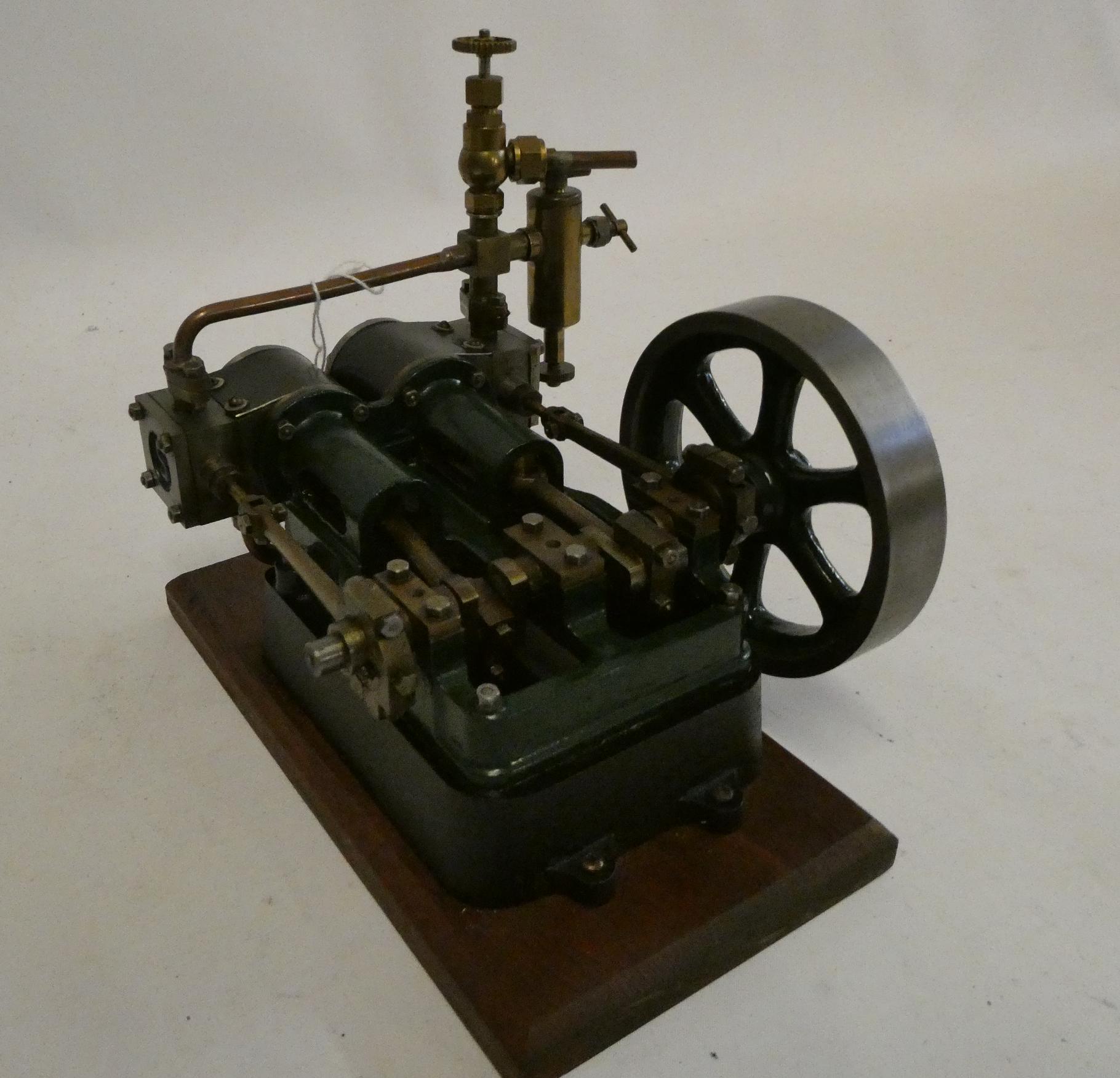 Stuart Turner score non-reversing twin cylinder steam engine with steam inlet valve and displacement Image