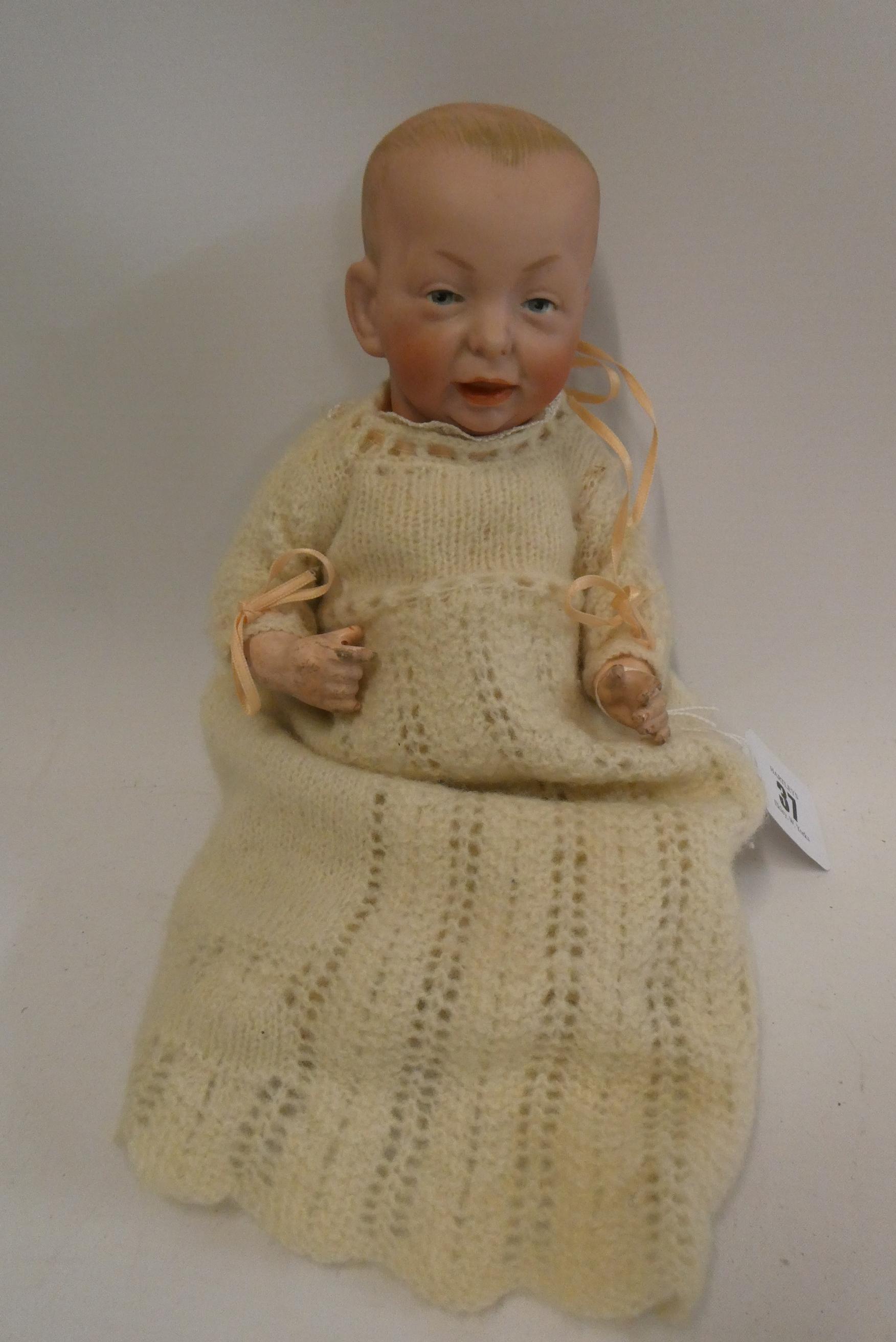 A Kammer & Reinhardt bisque socket head character doll, with painted features, bent limb composition Image