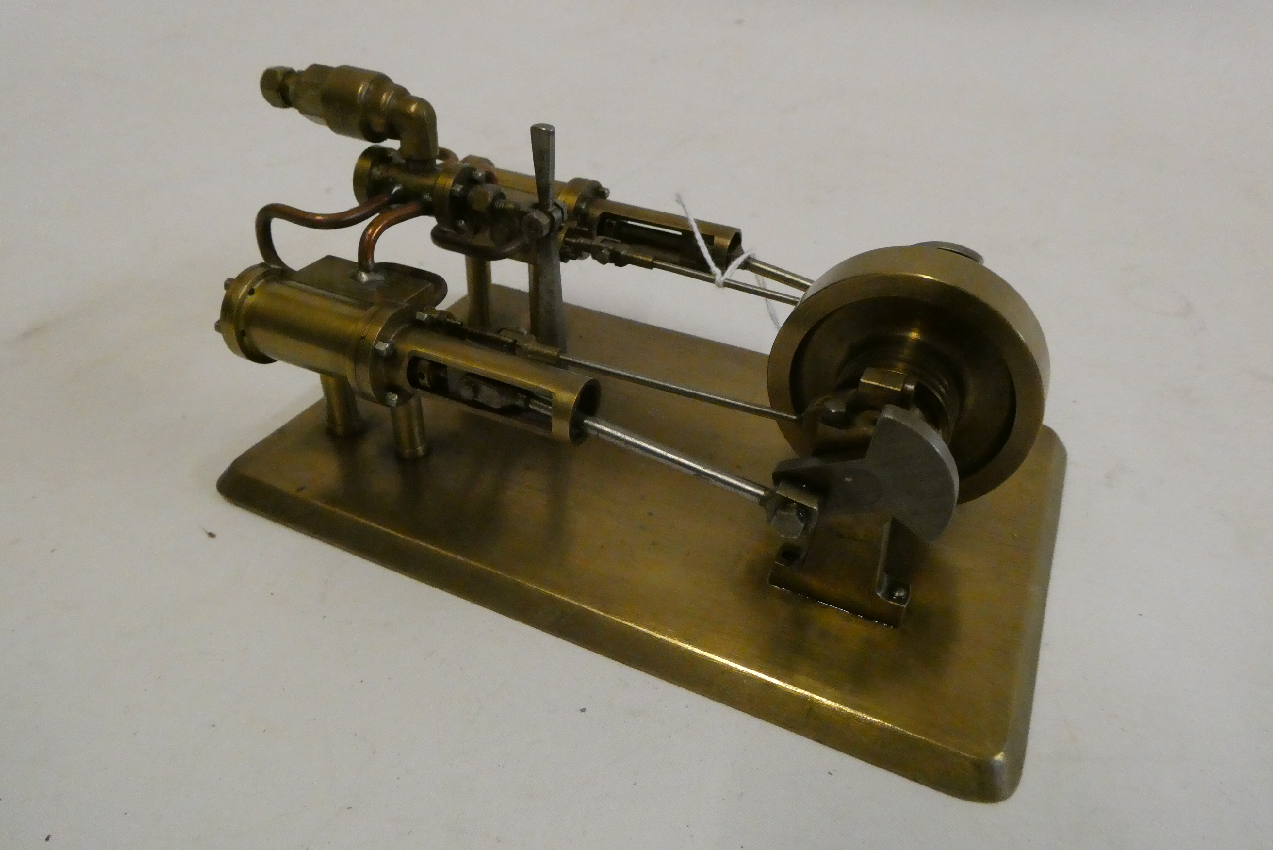 A twin cylinder horizontal steam engine of fabricated brass construction with reversing valves on Image