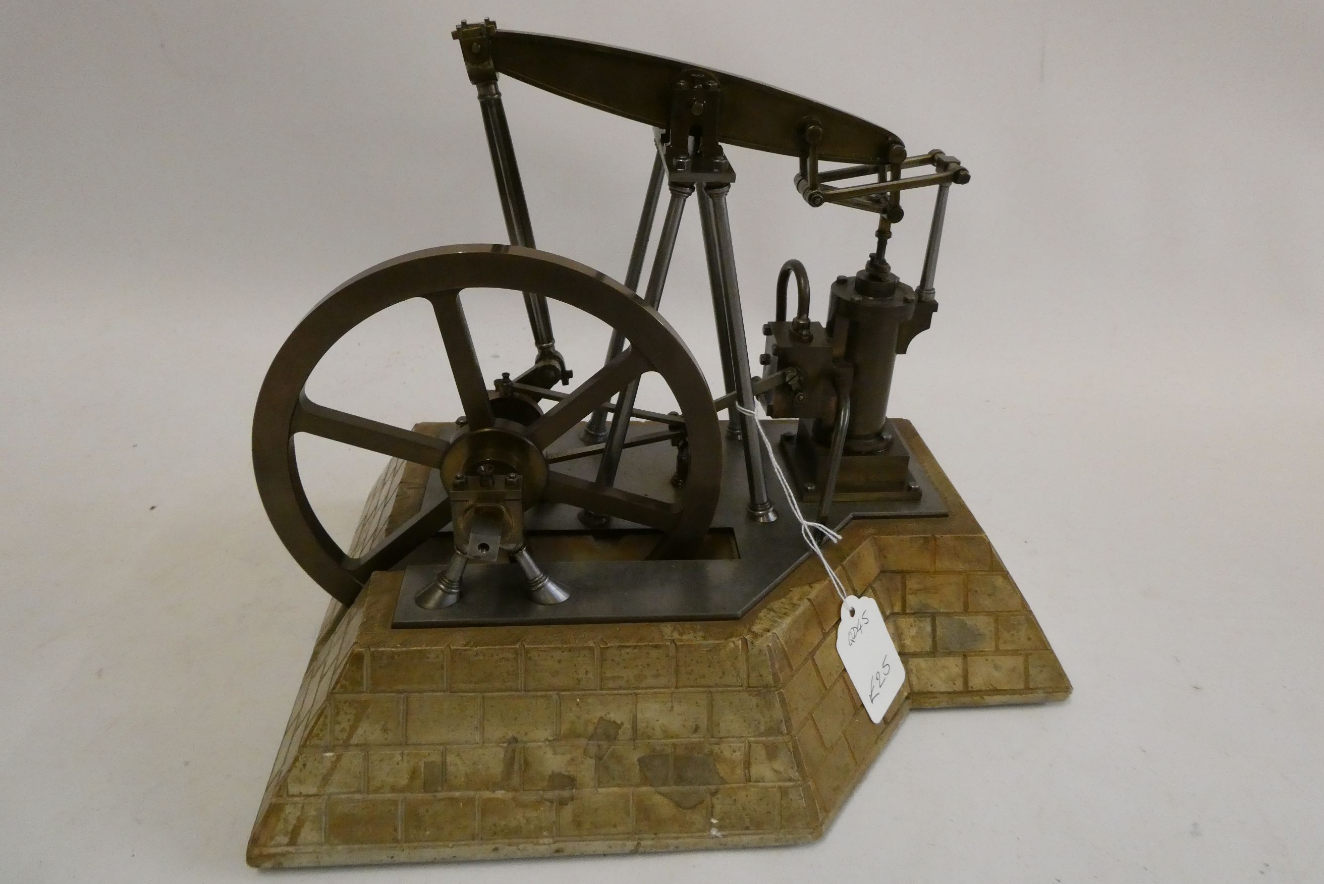 An unusual beam engine model with A frame beam and flywheel bearing support, brass and steel Image