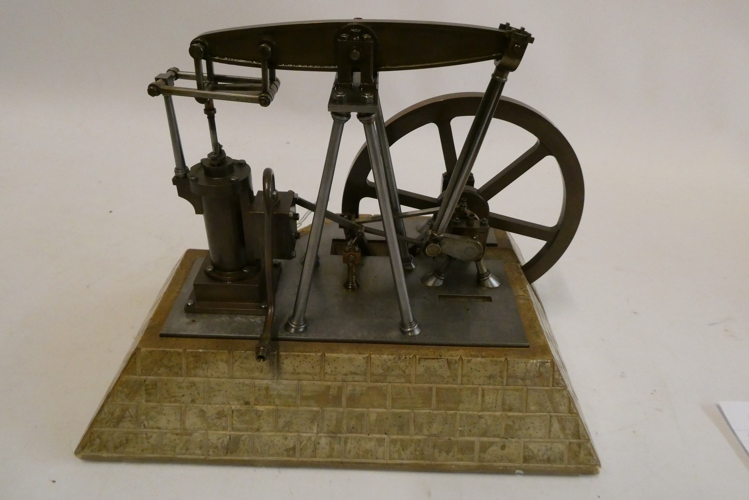 An unusual beam engine model with A frame beam and flywheel bearing support, brass and steel Image