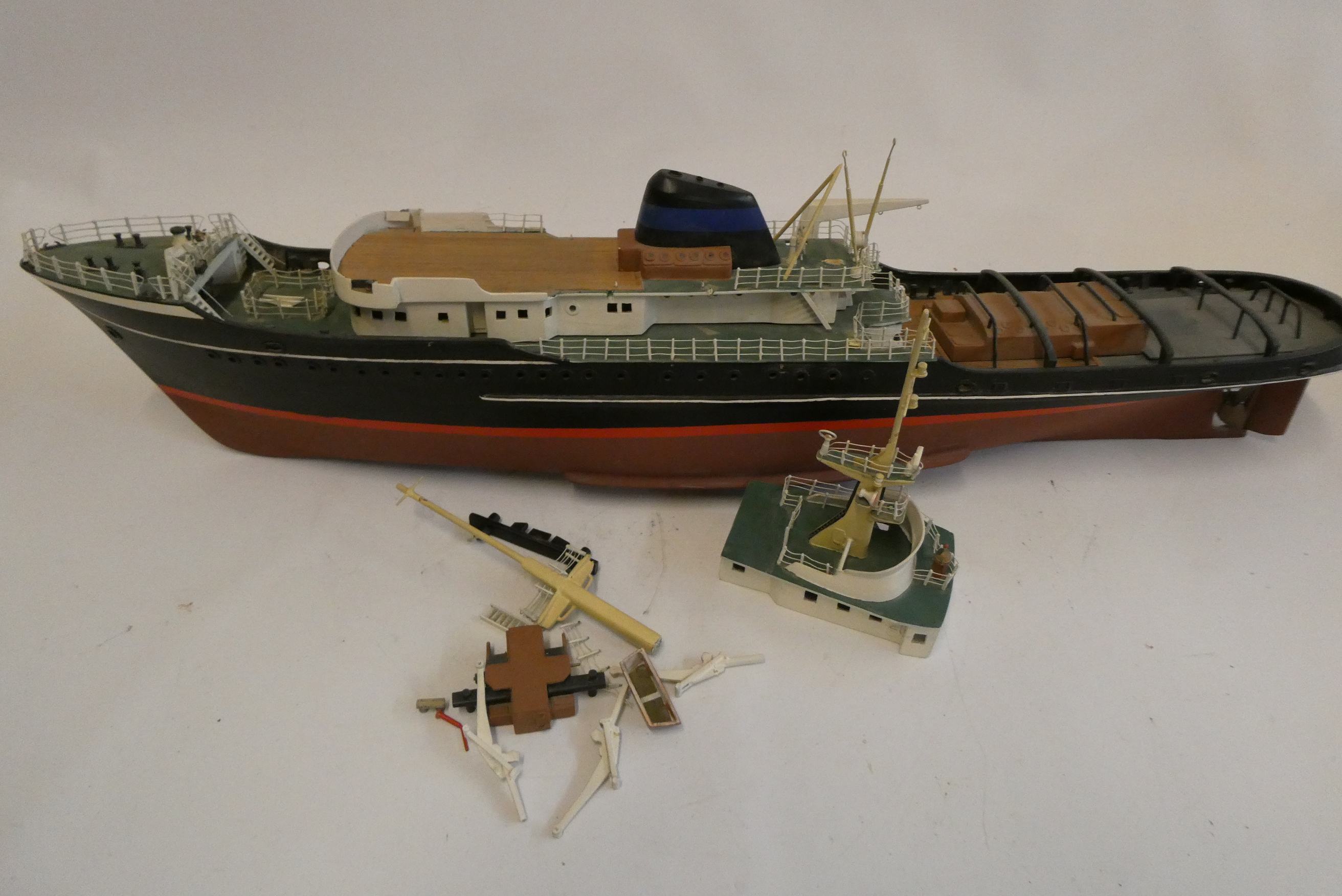 Unpowered model of ocean going cargo ship, many items detached from superstructure to be found in Image