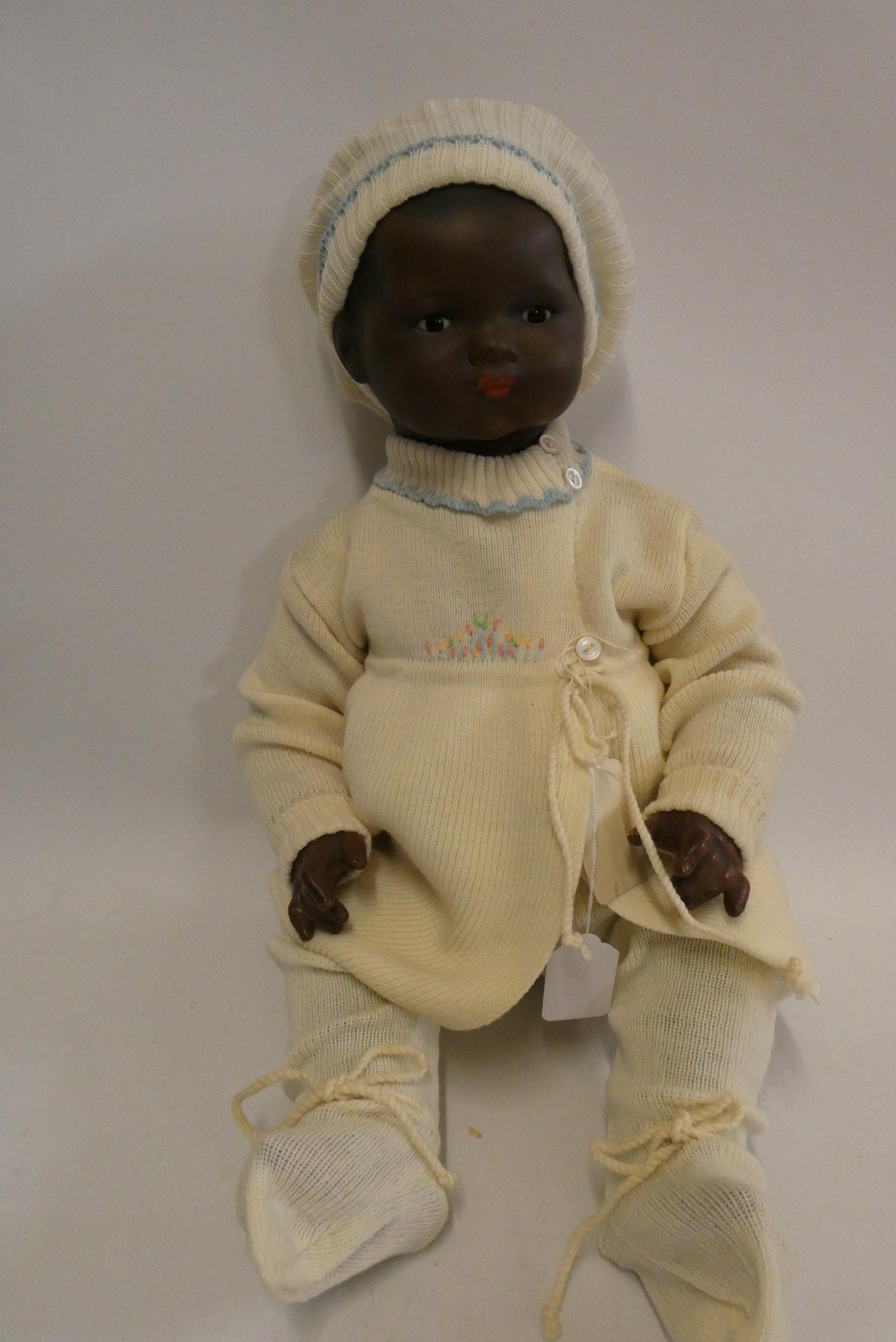 An Armand Marseille bisque socket head baby doll Image
