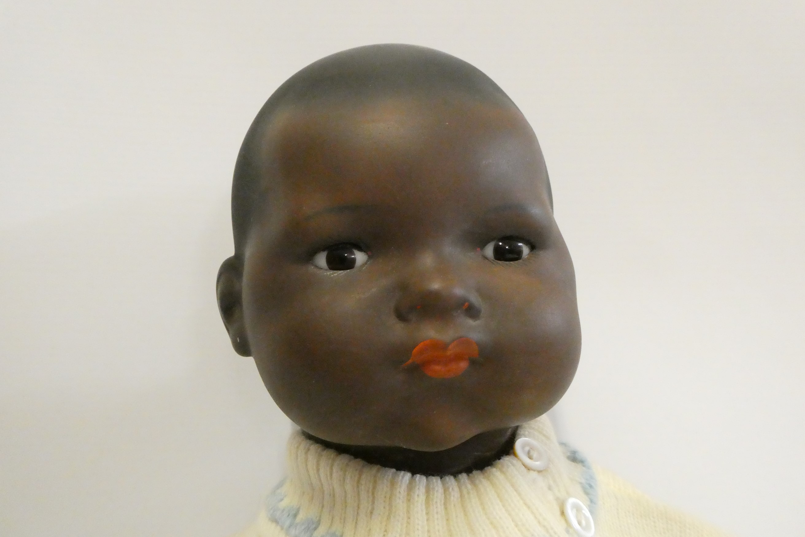 An Armand Marseille bisque socket head baby doll Image