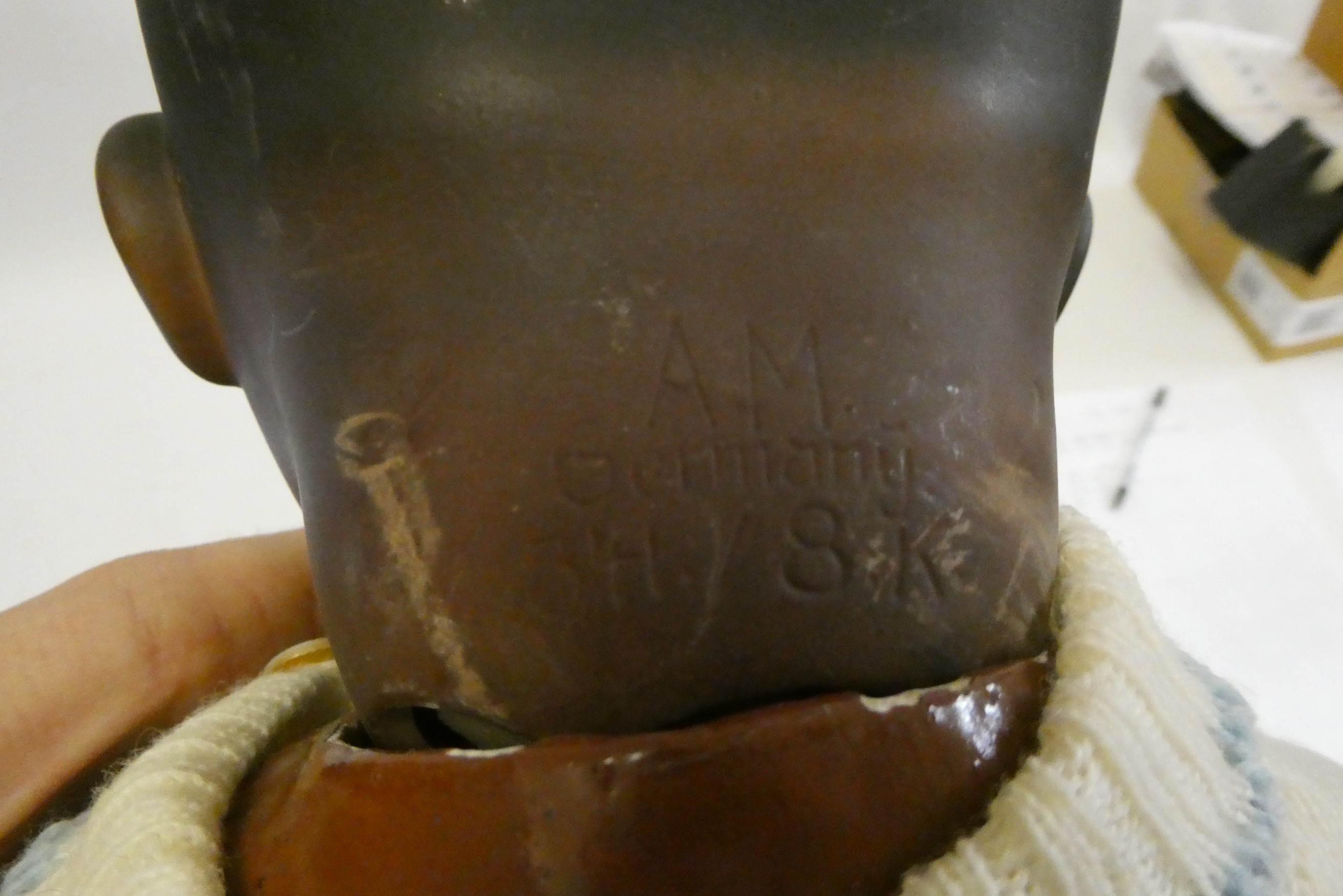 An Armand Marseille bisque socket head baby doll Image