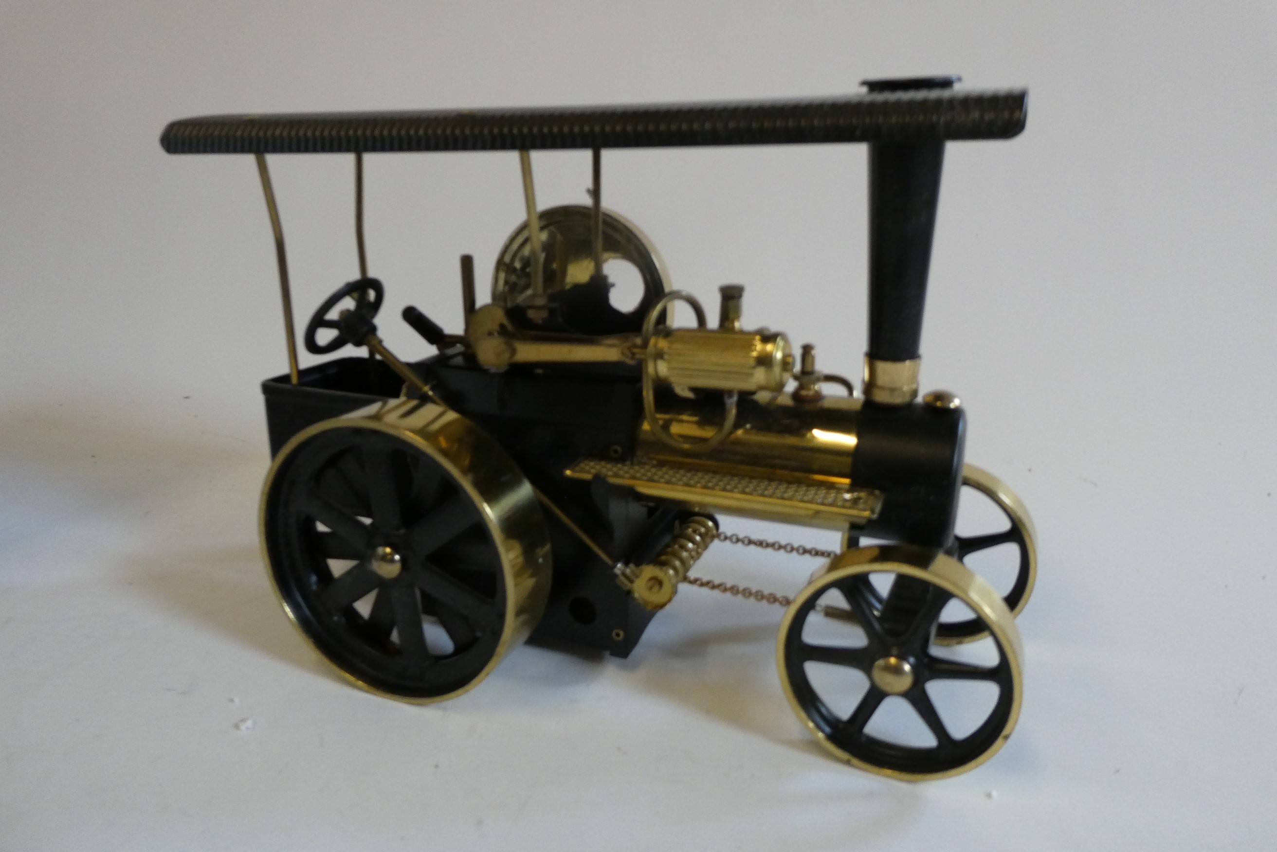 Wilesco steam traction engine finished in polished brass and black, boxed, good to excellent Image