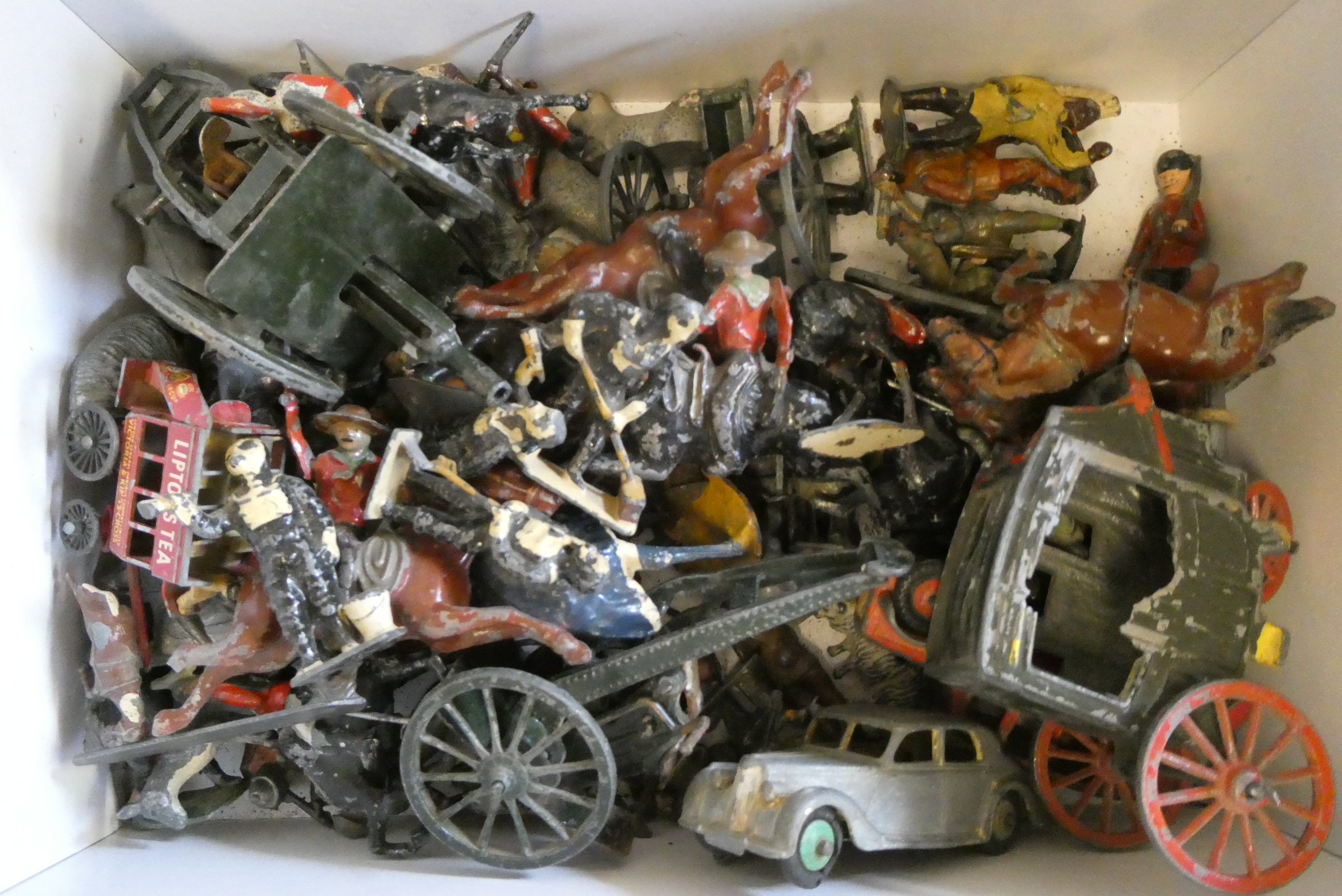 Unboxed lead figures including Zoo animals, Cowboys, Indians, solders and three playworn vehicles, Image