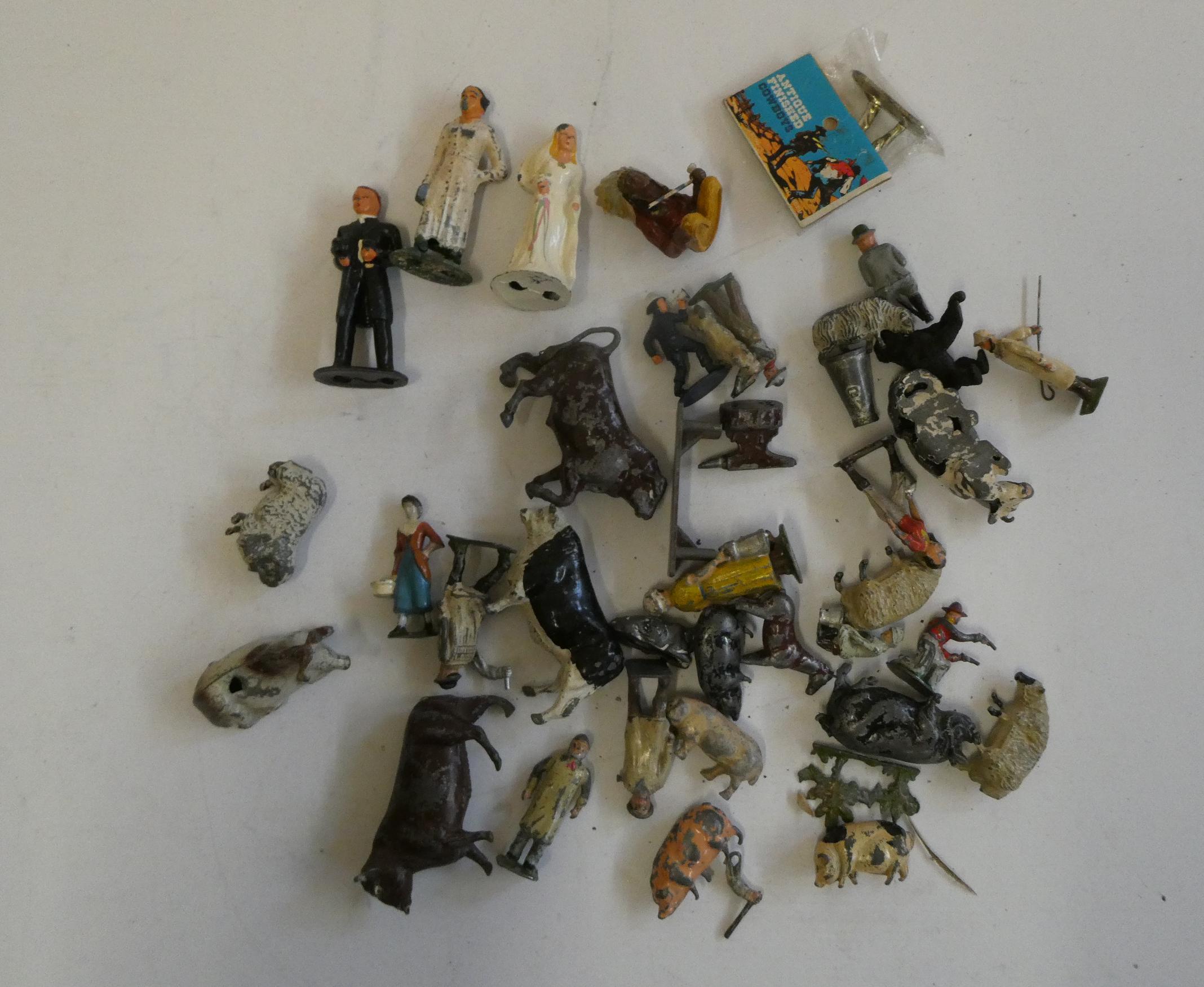 Small quantity of lead figures by Britains and others including farm animals, farm workers, cowboys Image