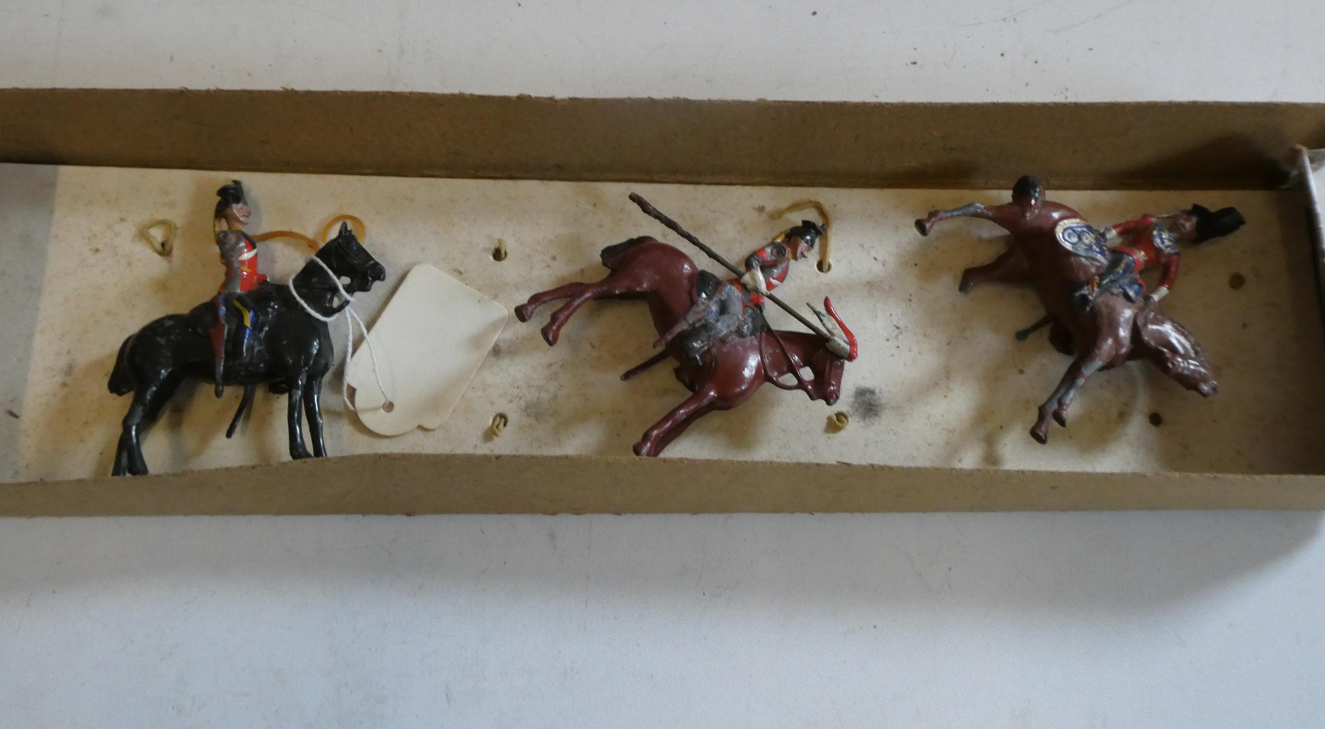 Lead Royal Lancers on horseback, one horse leg missing, one lance missing, poor Image