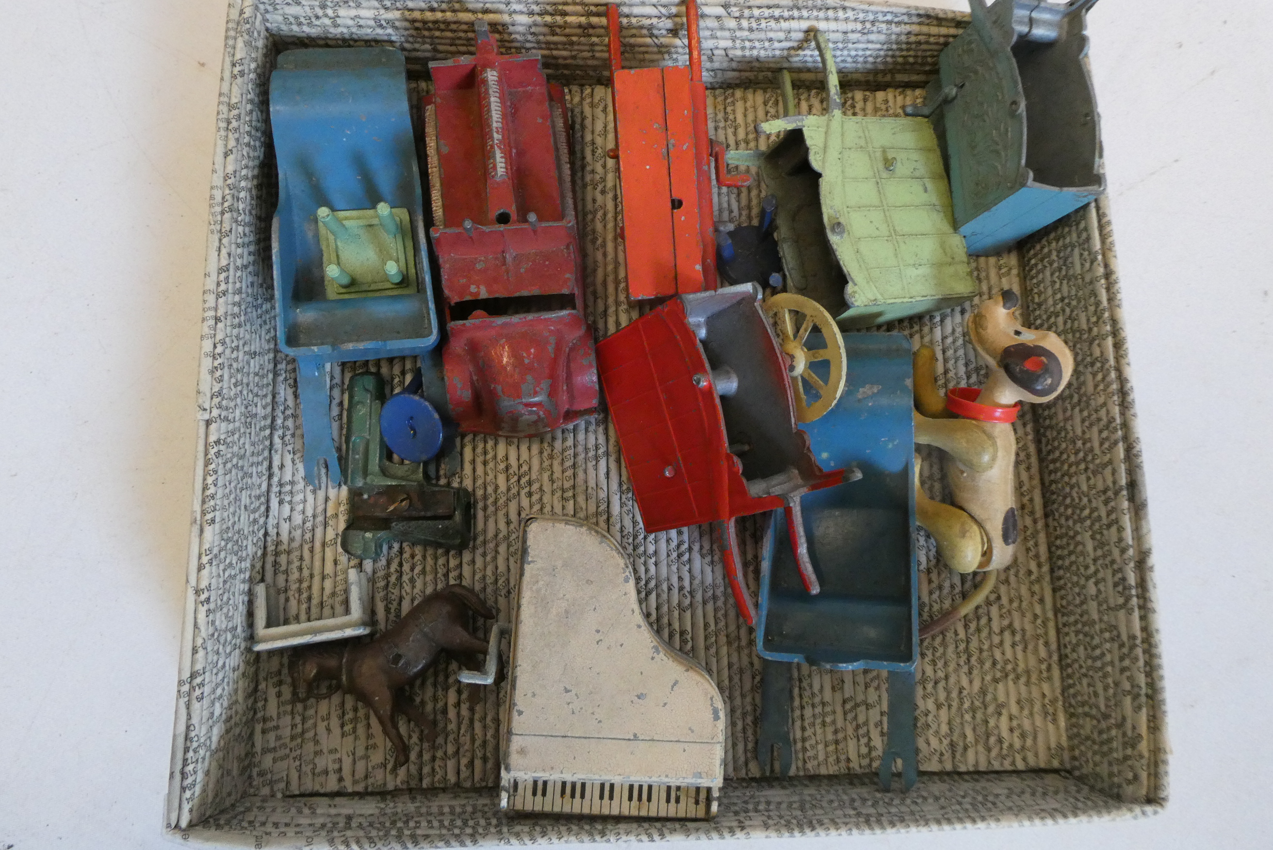 Damaged lead items by SALCO including barrel organs, piano and fire engine Image