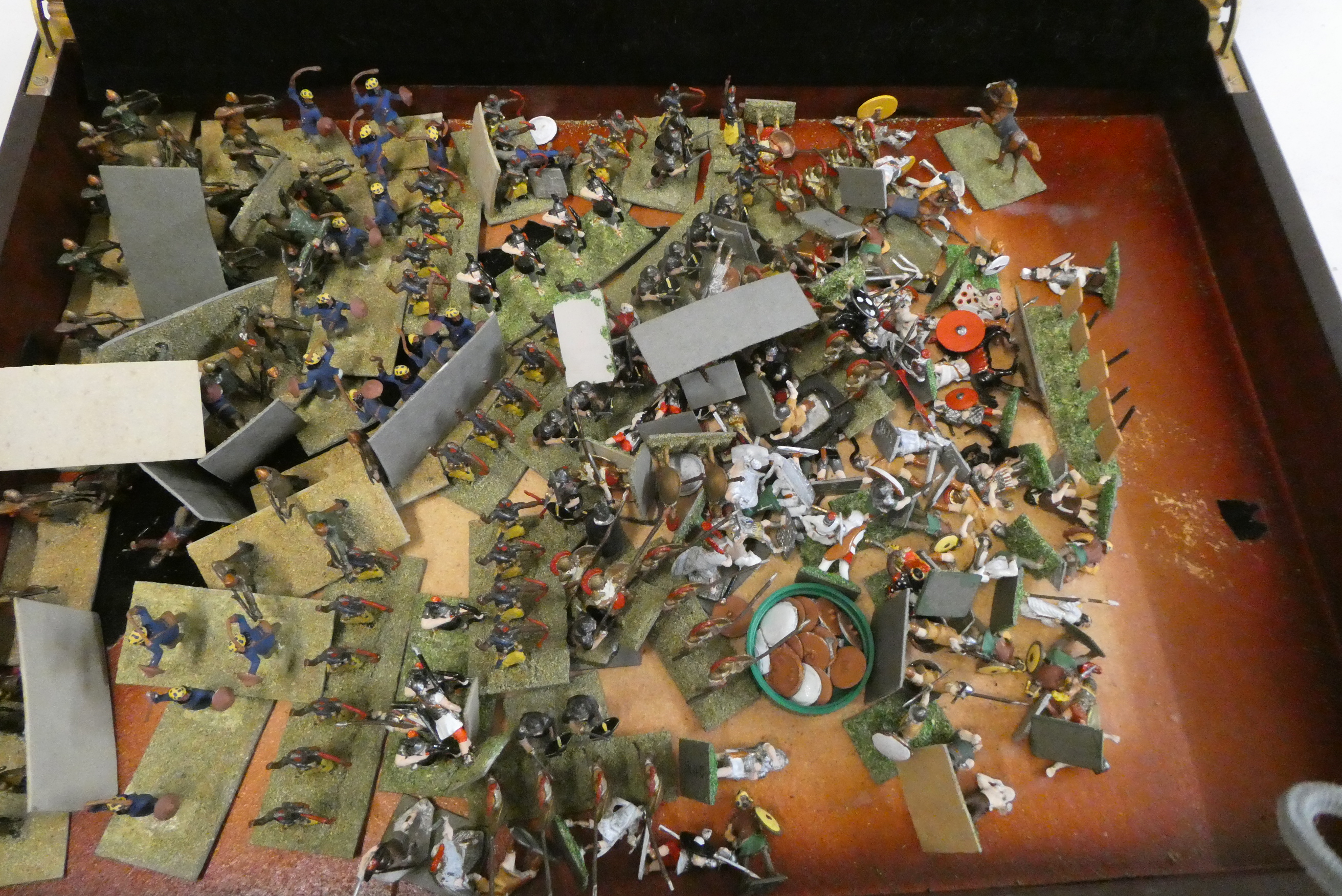 30mm war game soldiers comprising Persian Bowman and Roman soldiers, well painted, on grass stand Image