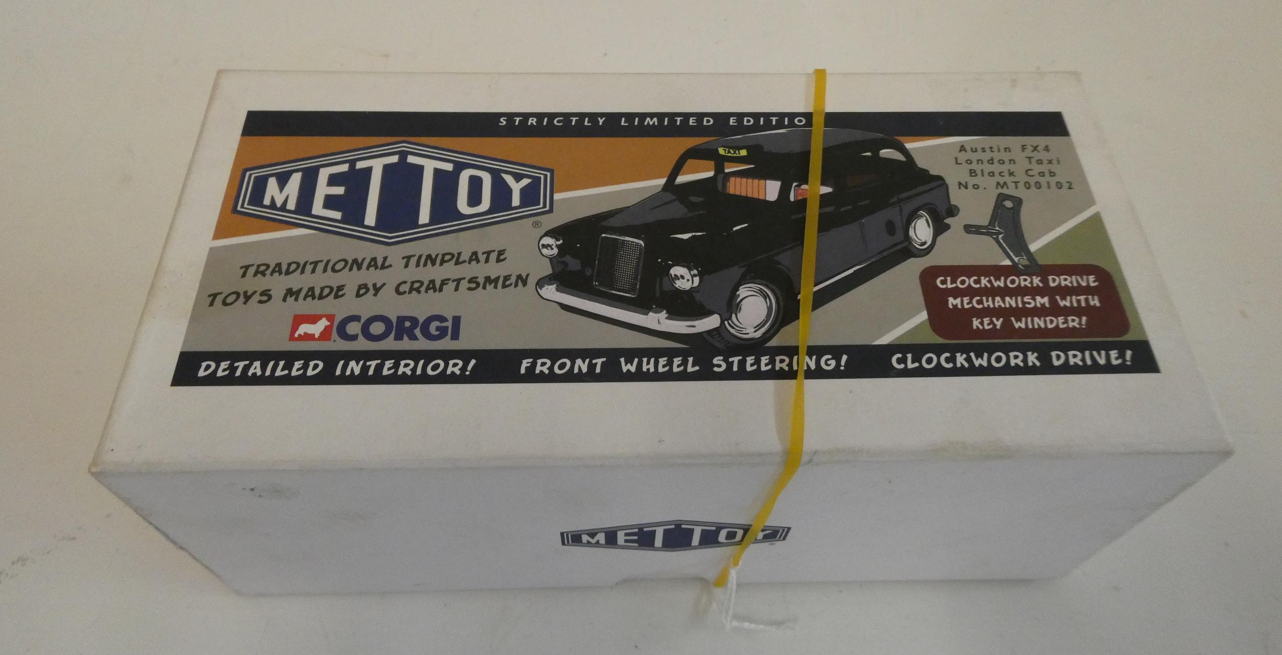 Mettoy Corgi London Taxi, boxed, Excellent to mint. Image