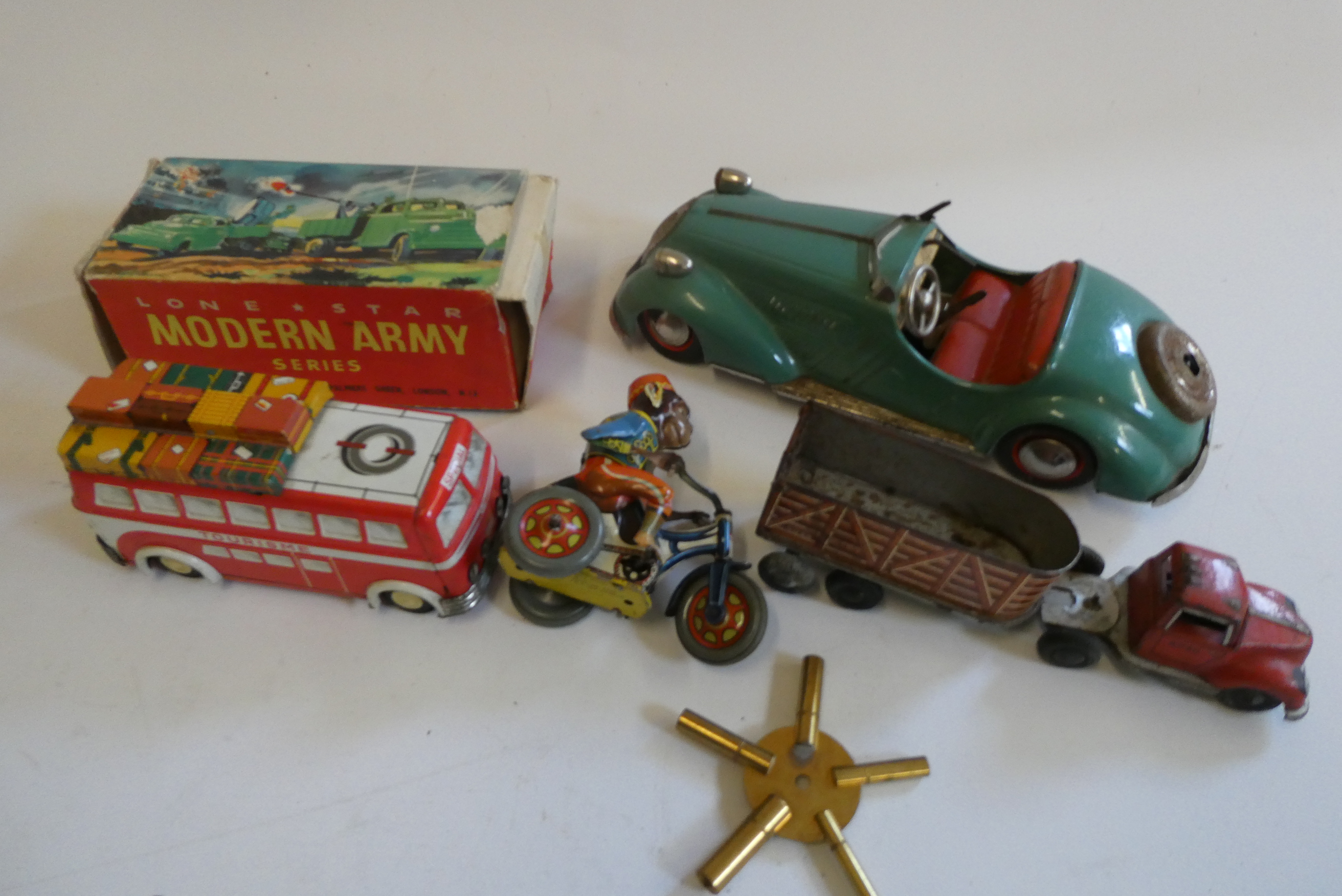 Tinplate toys comprising Disler clockwork saloon Image