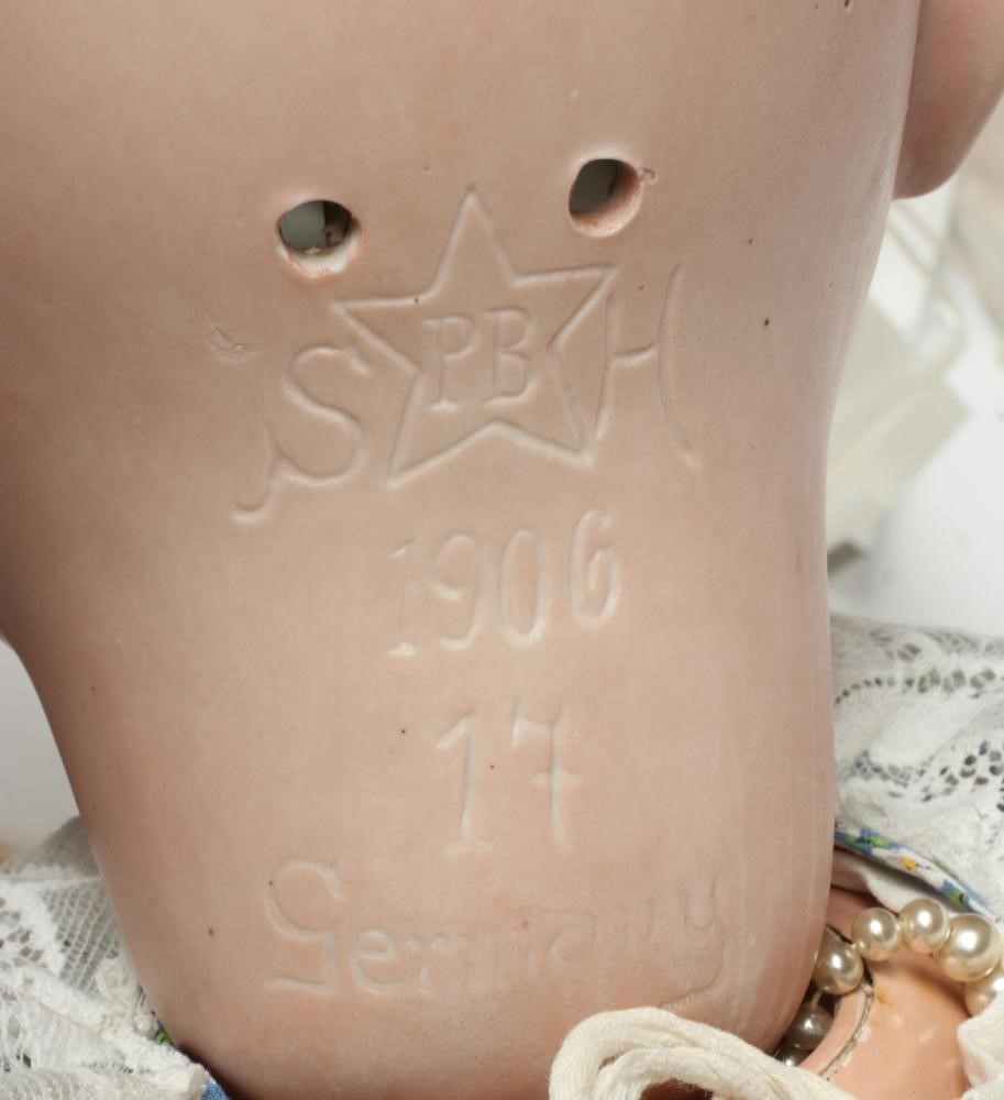 A large Schoenau & Hoffmeister bisque socket head doll Image