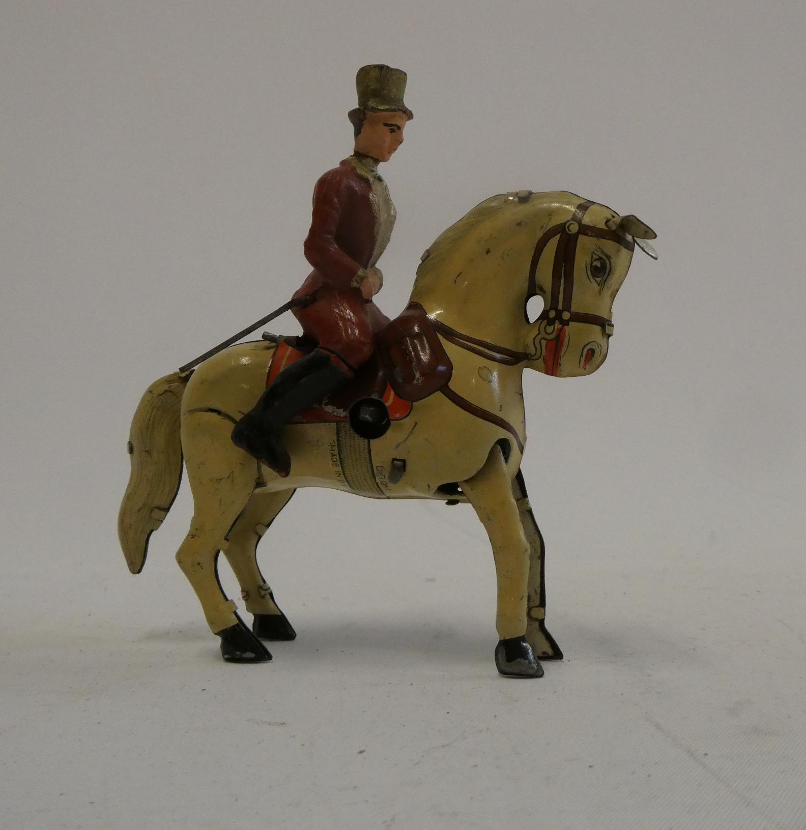 Clockwork dressage horse and rider with hopping action from horse. Tested in good working order, Image