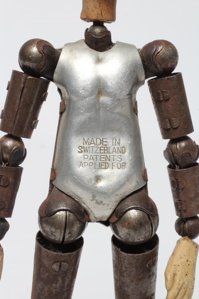 Bucherer Acrobatic Doll, with metal articulated body stamped "MADE IN SWITZERLAND PATENTS APPLIED Image