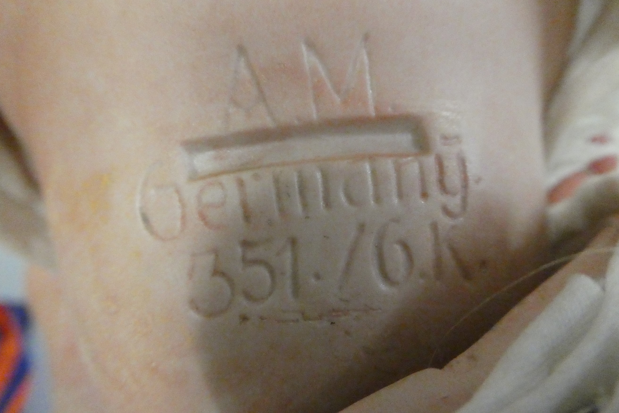 An Armand Marseille bisque socket head baby doll Image