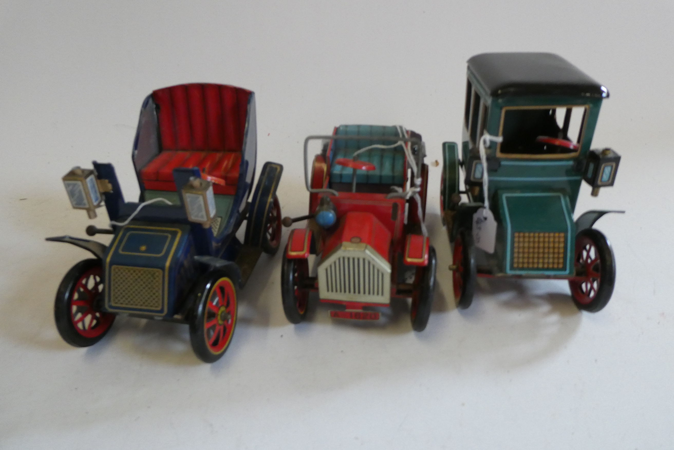 Three Nomura (TN) lever action spring driven vintage cars, all items have minor marks to tinplate, Image