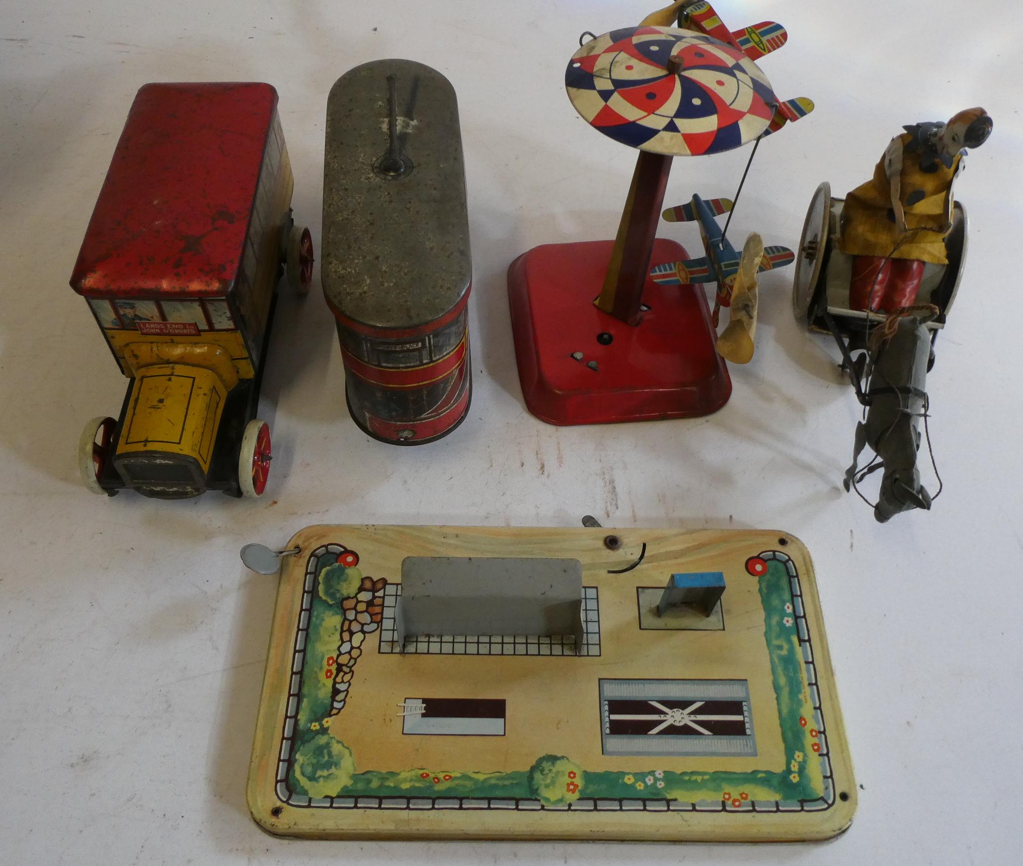 Tinplate biscuit tin tram and Gray Dunns biscuits bus, some rusting, paint damage fair and a Image