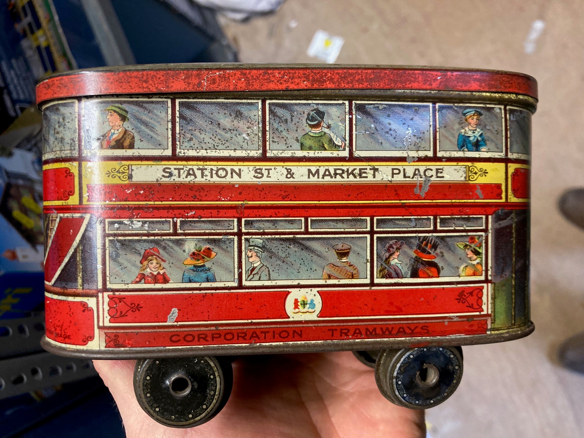 Tinplate biscuit tin tram and Gray Dunns biscuits bus, some rusting, paint damage fair and a Image
