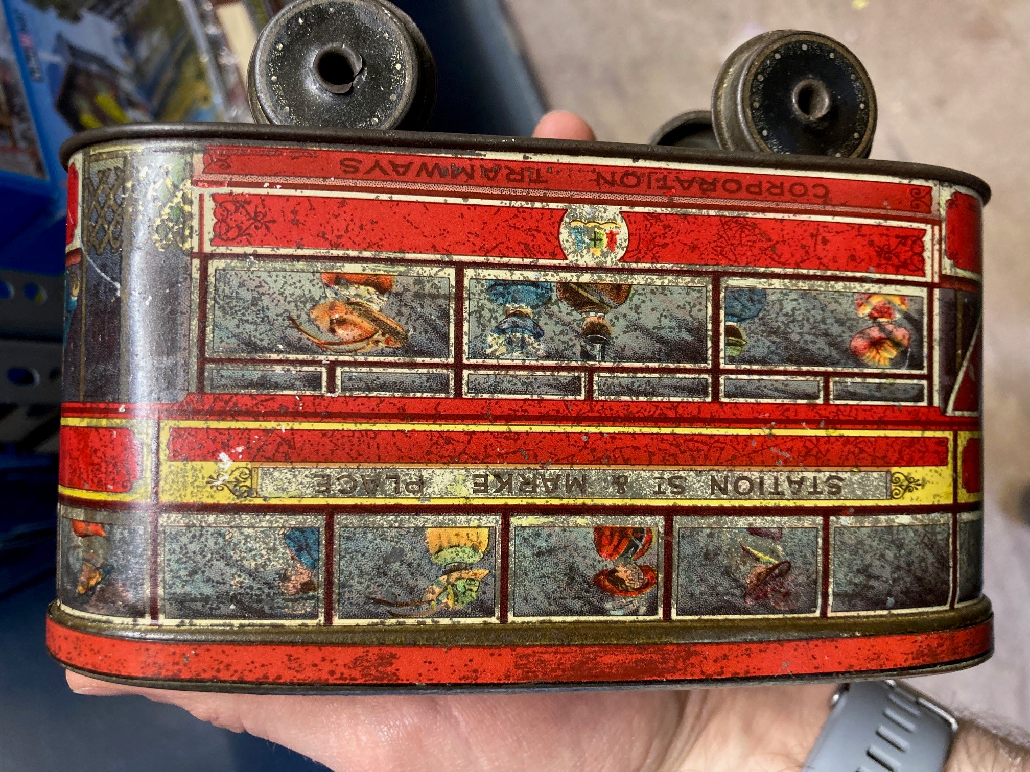 Tinplate biscuit tin tram and Gray Dunns biscuits bus, some rusting, paint damage fair and a Image